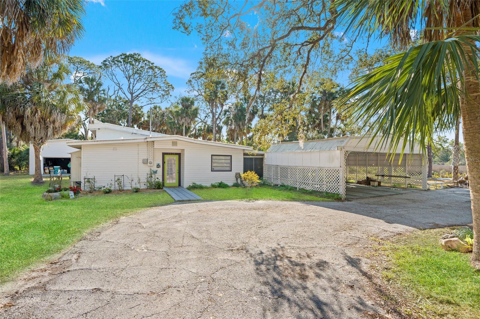 RARE & REMARKABLE OPPORTUNITY! Discover the perfect blend of privacy, coastal beauty, and future potential with 5 acres MOL offering stunning Gulf views and indirect Gulf access. This truly one-of-a-kind property delivers the ultimate Old Florida lifestyle — where nature, water, and wide-open space come together.
The updated 2-bedroom, 1.5-bath home is full of classic Florida character and charm, thoughtfully improved while maintaining its coastal appeal. One of the standout features is the covered and screened patio overlooking the canal — the ideal setting for morning coffee, evening sunsets, fishing, bird watching, and enjoying the peaceful waterfront surroundings. This property feels like your own private sanctuary.
For those who need extra space, the impressive 28x24 detached garage provides ample room for boats, kayaks, workshop space, or additional storage. Another amazing feature is the private neighborhood park area across the street that provides direct access to the Gulf. Located just minutes from Hernando Beach, shopping, and local restaurants, you’ll enjoy the charm of this laid-back coastal community while still having acreage that is nearly impossible to find near the water. Whether you’re looking for a private waterfront retreat, multigenerational living potential, or future investment opportunity with subdivision options per Hernando County, this property delivers flexibility and upside that are hard to match.
Waterfront acreage. Gulf views. Endless potential.
This is what Florida dreams are made of.