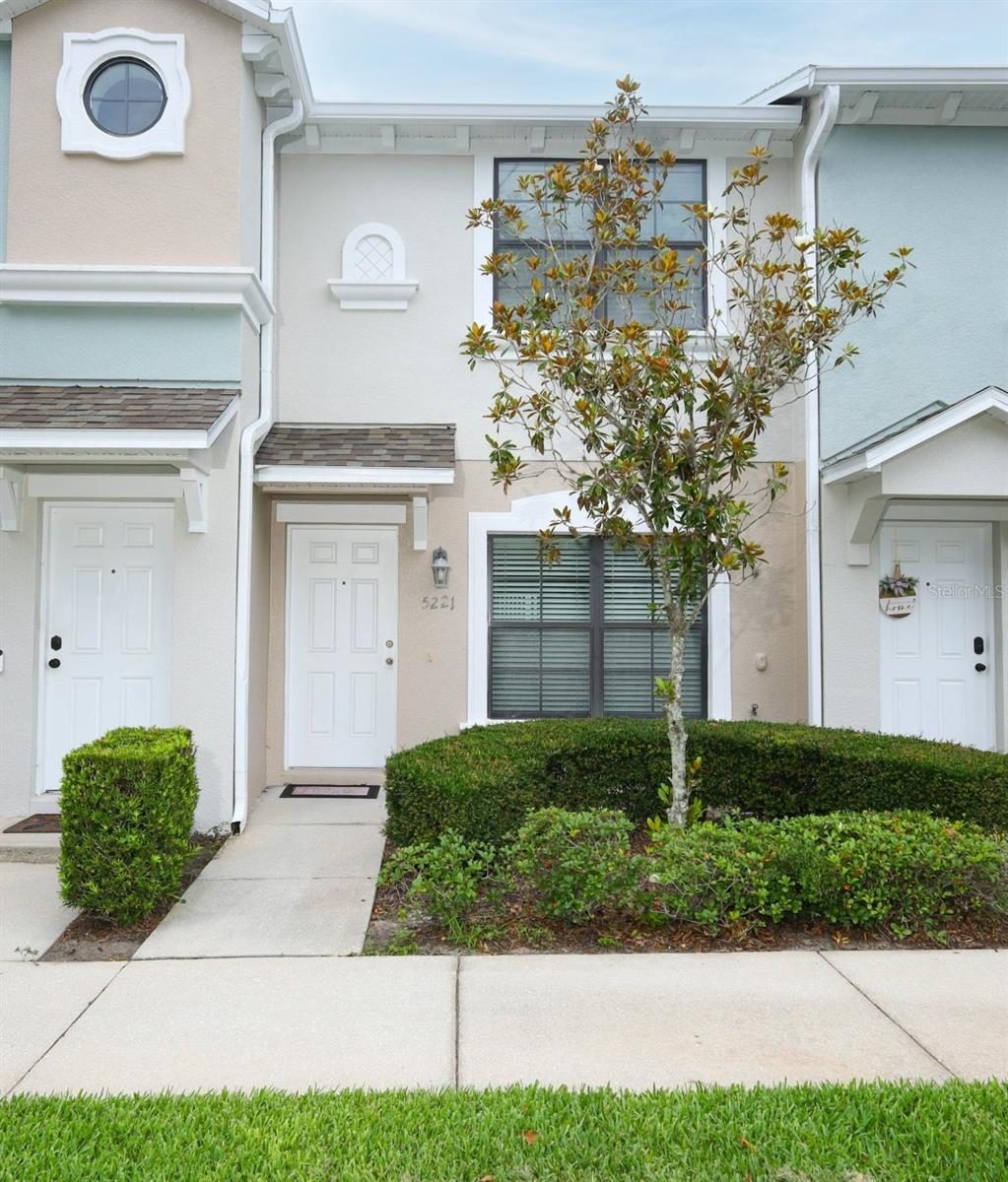 Enjoy convenient, carefree living in this move-in-ready townhome located within the gated community of Windsor Lake.  Zoned for some of the most desirable schools in the county., this home is perfect for first-time homebuyers, busy professionals, college students, seasonal residents, or investors This well-maintained home allows you to spend less time on maintenance and more time enjoying life.  
Recent updates include a new roof, fresh interior paint, and new flooring, making this home truly move-in ready. The open-concept main floor seamlessly blends the kitchen, dining, and living areas, creating an inviting space for everyday living and entertaining. Upstairs, you'll find two spacious bedrooms, each featuring its own private en-suite bath for maximum comfort and privacy.
Start your day with a cup of coffee or unwind in the evening on the private back patio. Then sit back and relax knowing the HOA handles many of the time-consuming exterior responsibilities. The low monthly fee includes roof maintenance, exterior building maintenance, lawn care and landscaping, termite treatment, cable and trash service.
Residents enjoy access to resort-style community amenities, including a sparkling pool and playground. Conveniently located near SR-417, I-4, shopping, dining, public transportation, and Central Florida's top attractions and beaches, this home offers the perfect combination of comfort, convenience, and peace of mind.
Whether you're searching for a primary residence, vacation retreat, or investment property, this exceptional townhome delivers the lifestyle you've been looking for—easy, convenient, and virtually maintenance-free.