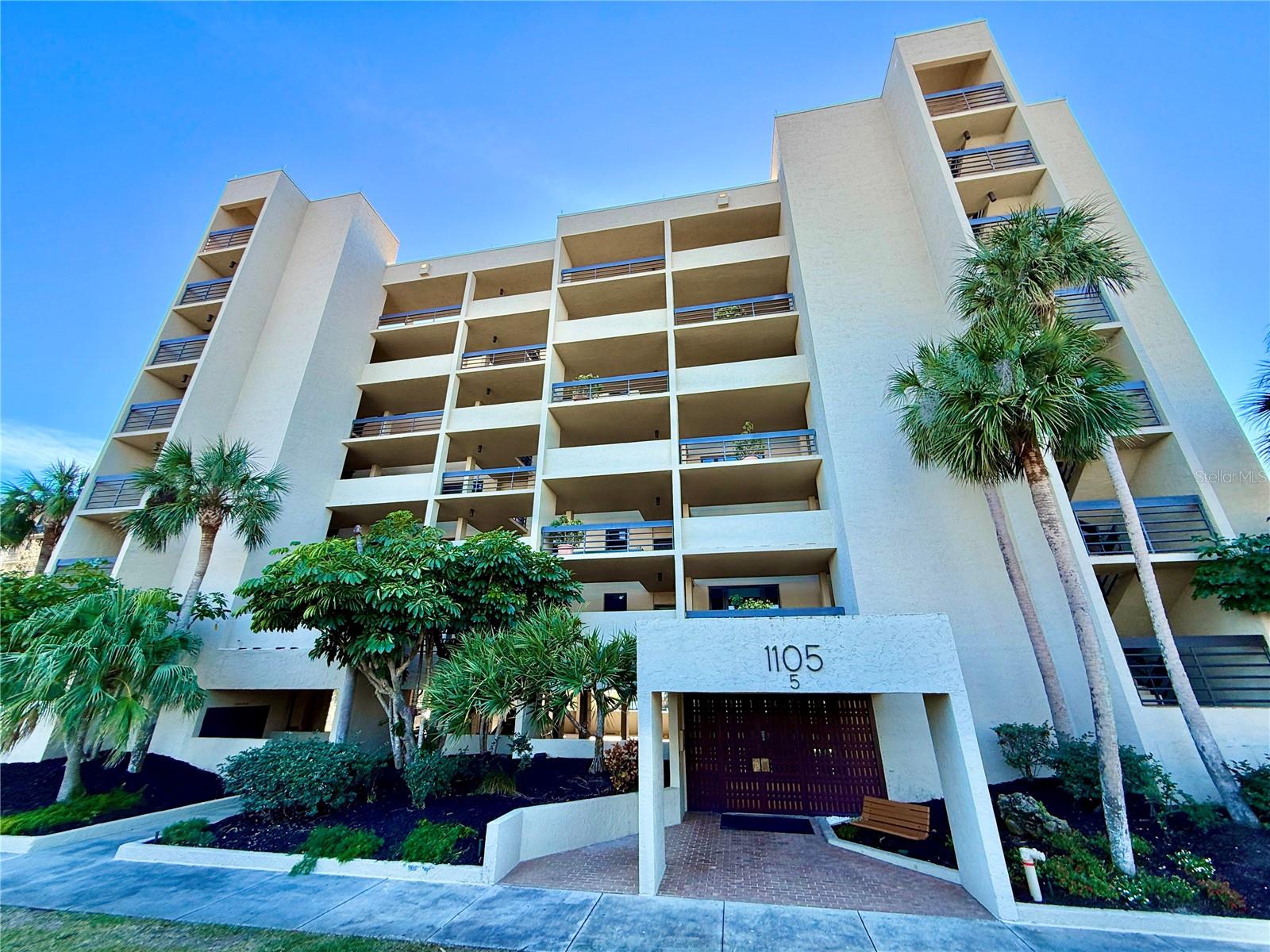 Direct Ocean view from this Bright Airy corner unit in desirable building five. Catch the view of the Gulf of Mexico and Sunsets from your balcony. To see this property is to fall in love with easy living! You need to visit this unit to get a sense of the remarkable views , especially the amount of light that permeates the entire interior. Beachplace is a perfect get away on the south end of Longboat Key, and comprise many amenities. Pickle Ball, Tennis, two exercise facilities, Olympic pool, with designated lap lanes, over size hot tub , covered baby pool . Electric car chargers, gas grill, two types of workout facilities on almost 31 acres of lush landscaped grounds. Please visit to see why this building and unit are the best of BEACHPLACE!