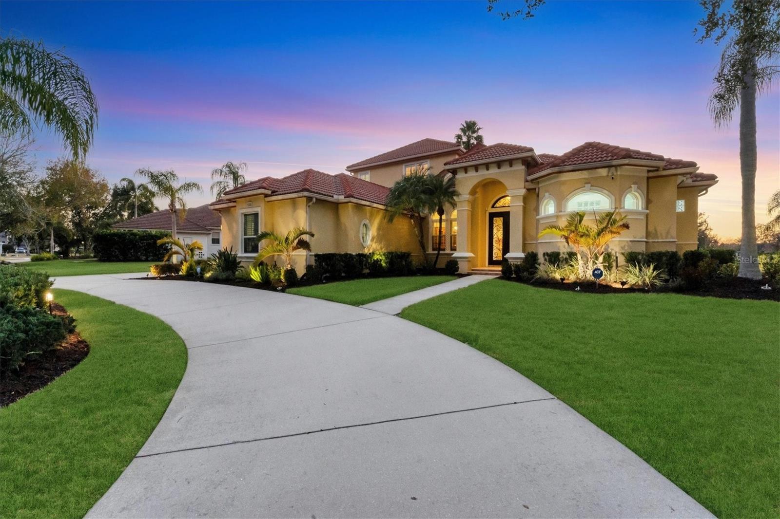 Welcome to this fully remodeled golf course home in River Club in Lakewood Ranch, ideally positioned on the 17th fairway of the River Club Golf Course with peaceful lake views in the front and expansive golf course views in the rear. This River Club property offers rare privacy with no home directly across the street or behind, and a larger homesite.

River Club in Lakewood Ranch is known for oversized lots, mature landscaping, low HOA fees, and no CDD fees, making it one of the most desirable established golf course communities near Sarasota.

This upgraded River Club home features a circular driveway, elevated lot, luxury vinyl plank flooring, a custom built entertainment center, and an open layout ideal for entertaining. The remodeled kitchen includes stainless steel appliances, generous counter space, a custom pantry, and a dedicated coffee and wine bar.

Designed for Florida living, this home includes a saltwater pool and spa, outdoor kitchen, pool bath, and clearview screened lanai overlooking the 17th fairway. Retractable shades and professional landscape lighting enhance both comfort and curb appeal.

Additional features include a buried 250 gallon propane tank, custom fitted closets, plantation shutters, and power honeycomb shades for energy efficiency.

Located just minutes from Main Street Lakewood Ranch, Waterside Place, downtown Sarasota, Gulf Coast beaches, I-75, and Sarasota Bradenton International Airport, this River Club golf course home offers space, privacy, and long term value in one of the most strategically located communities in the Lakewood Ranch area.

If you are searching for River Club homes for sale with a pool, large lot, and golf course views, this property checks every box.