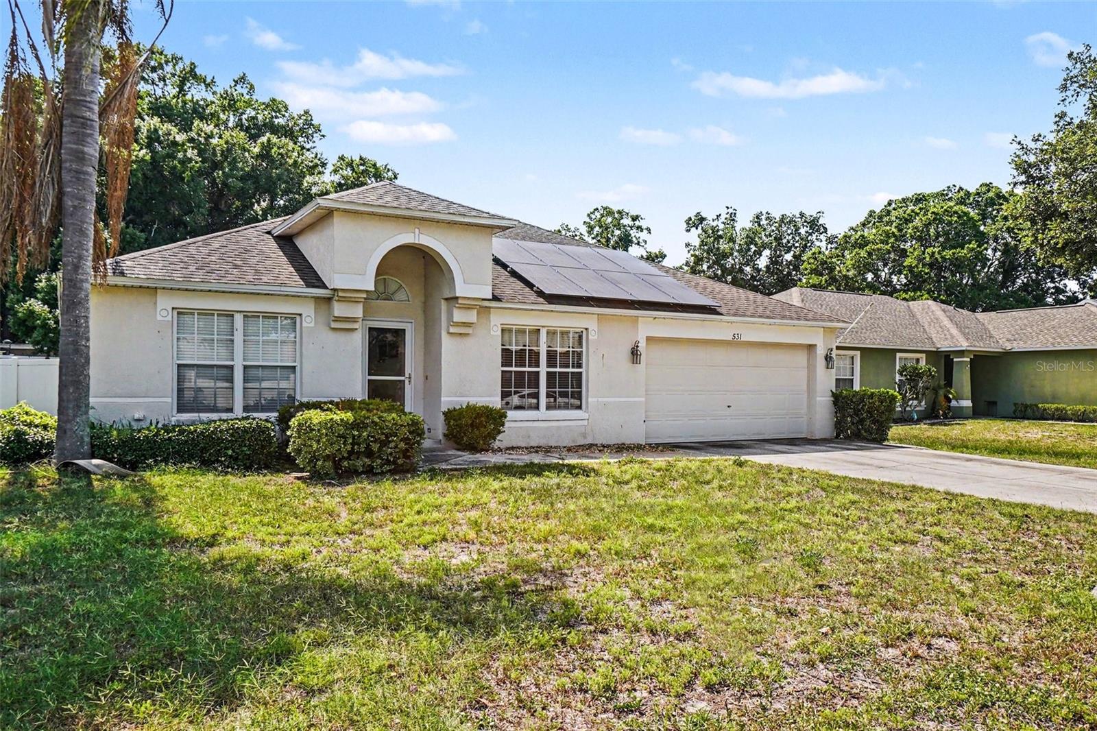 Welcome home to this affordable, beautifully designed single-family residence nestled in the desirable Heather Glen community! Spanning 1,538 sq. ft. of comfortable living space, this 3-bedroom, 2-bathroom home features a highly sought-after split-bedroom floor plan decorated in inviting, neutral colors. The inviting interior boasts soaring vaulted ceilings, elegant plant ledges, and a spacious living room anchored by a cozy wood-burning fireplace. The fully equipped kitchen comes complete with a breakfast bar that opens seamlessly into the formal dining room.

Retreat to the expansive primary suite featuring large walk-in closets and a spacious layout. Step outside through the sliding doors to find a lovely covered patio and a fully fenced backyard, providing the perfect private oasis for pets, play, or outdoor dining. Complete with an attached 2-car garage and low monthly HOA fees, this home is centrally located close to schools, shopping, and dining!