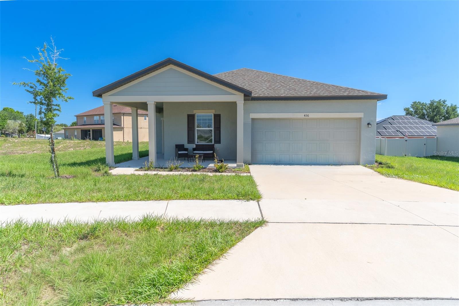 Welcome to this beautifully designed, move-in ready home nestled in the charming Mabel Place community of Lake Wales. This like-new, energy-efficient residence offers 3 bedrooms and 2 bathrooms in a thoughtfully designed single-story floor plan featuring an open-concept layout perfect for modern living. The bright and spacious family room seamlessly flows into the stunning kitchen, complete with granite countertops, upgraded cabinetry, brand-new stainless-steel appliances, a large breakfast bar, and an oversized pantry. The private primary suite offers a generous walk-in closet and an elegant en-suite bath, while two additional bedrooms provide flexibility for family, guests, or a home office. Enjoy Florida living from the welcoming covered front porch and appreciate the low-maintenance outdoor space. Additional features include beautiful tile flooring, an inside laundry room, and a spacious two-car garage.

Ideally located in the quaint, low-HOA community of Mabel Place, this home offers easy access to shopping, dining, parks, and the charm of Historic Lake Wales. You'll be just minutes from the iconic Bok Tower Gardens and family-favorite Legoland Florida Resort, with convenient access to Highway 17 and major Central Florida roadways, making commuting and day trips a breeze. Whether you're a first-time homebuyer, downsizing, or searching for a low-maintenance Florida retreat, this exceptional property combines modern comfort, energy efficiency, and an unbeatable location. Schedule your private showing today and discover why this beautiful home is the perfect place to call your own!