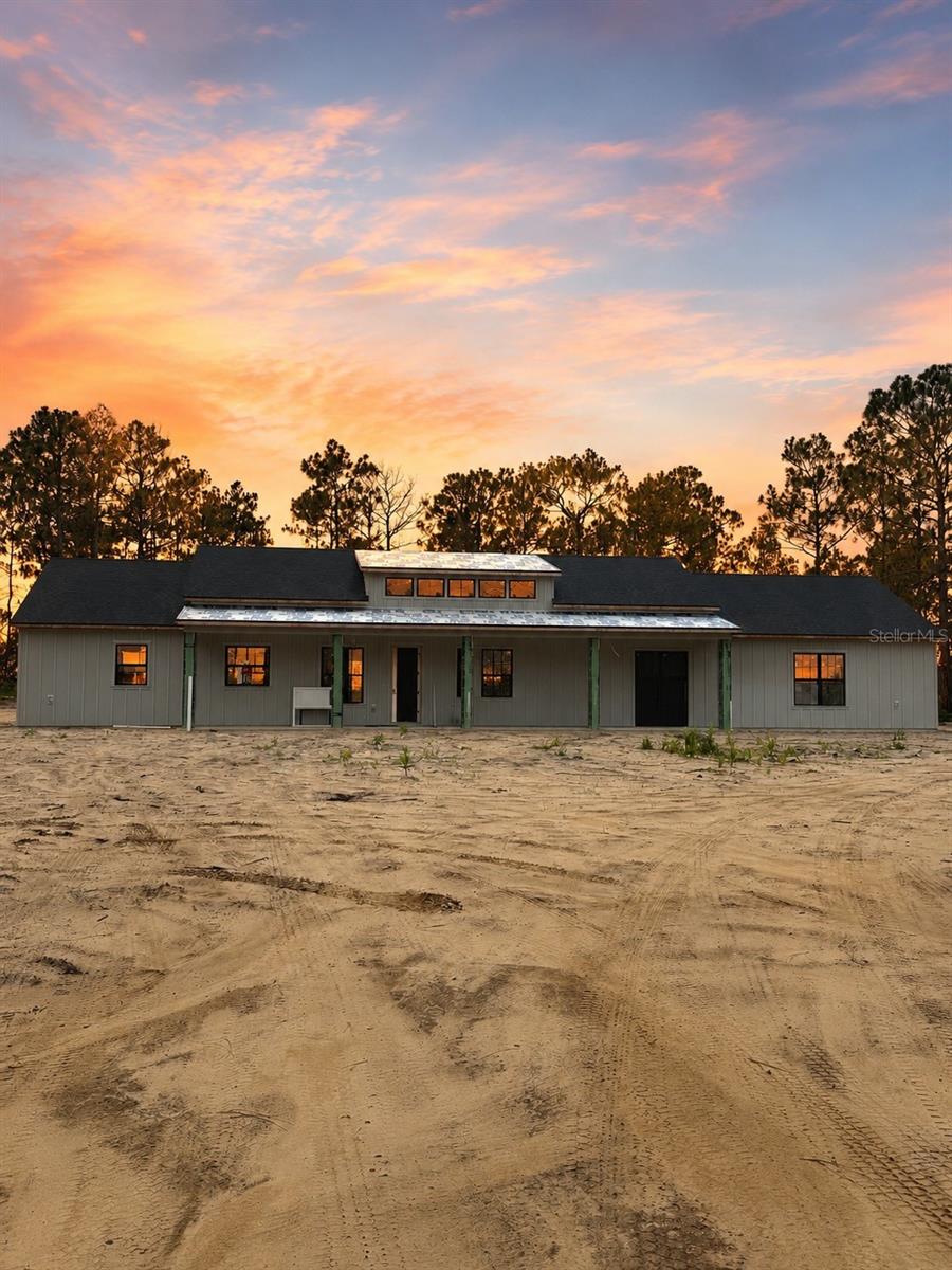 Welcome to Saratoga South, where luxury, privacy, and the equestrian lifestyle come together. This beautiful new construction modern farmhouse offers 4 bedrooms, 3 bathrooms, and a thoughtfully designed open floor plan that feels both inviting and functional. Gather around the gas fireplace on cooler evenings or enjoy the peaceful views of your expansive property from the comfort of your new home. Experience all the benefits of new construction while enjoying the space, tranquility, and freedom that only acreage can provide.

Situated on approximately 10 acres along a quiet paved road, this property is located within Saratoga South, an exclusive equestrian community consisting of just 34 estate homesites. Zoned A-1, the community features underground electric, paved roads, and deeded riding trails throughout, making it an ideal setting for horse lovers and those looking to enjoy a peaceful country lifestyle.

Whether you're bringing your own horses or planning for the future, Brije Custom Homes can build one of our thoughtfully designed floor plans or customize your own plans to create the perfect home for you and your horses.

The location is hard to beat, bordering Goethe State Forest and just minutes from Black Prong Equestrian Village, HITS Ocala, and the Jockey Club. The World Equestrian Center is only about 18 minutes away, while nearby rivers and the Gulf offer endless opportunities for fishing, boating, and outdoor recreation. Conveniently located between Ocala and Gainesville, you'll enjoy the serenity of country living without sacrificing easy access to shopping, dining, healthcare, and everyday conveniences.

If you've been dreaming of a brand-new home with room to roam in one of North Central Florida's premier equestrian communities, this is an opportunity you won't want to miss.