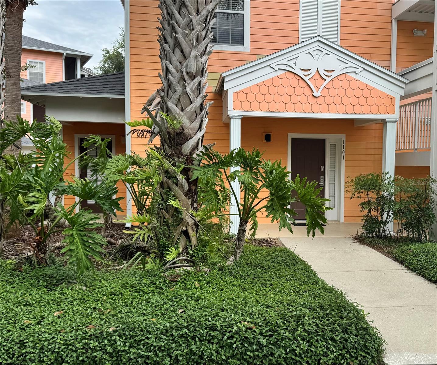 A MUST SEE IF YOU ARE CONSIDERING PURCHASING IN BAHAMA BAY. PRICED TO SELL! Step into this fully furnished,  2-bedroom, 2-bathroom first-floor sanctuary, designed for effortless resort living. Perfect as a short term rental investment property, personal tropical getaway, or a flexible combination of both. The open-concept layout flows seamlessly to your private patio, where you can sip your morning coffee while enjoying a peaceful, relaxing view of the pond. Largest 2/2 units in the complex.This ground-floor gem offers ultimate convenience with no stairs to climb, making it a highly sought-after option for vacation guests. Nestled within the 24-hour guard-gated Bahama Bay Resort, you are just minutes from Disney World, world-class golf, and luxury shopping, while being steps away from sparkling pools and lush tropical landscaping. Whether you choose to self-manage via Airbnb/VRBO or utilize on-site management company, this property is ready to generate income from day one! Note - certain community amenities are only available for owners who utilize the onsite management company to rent their units.