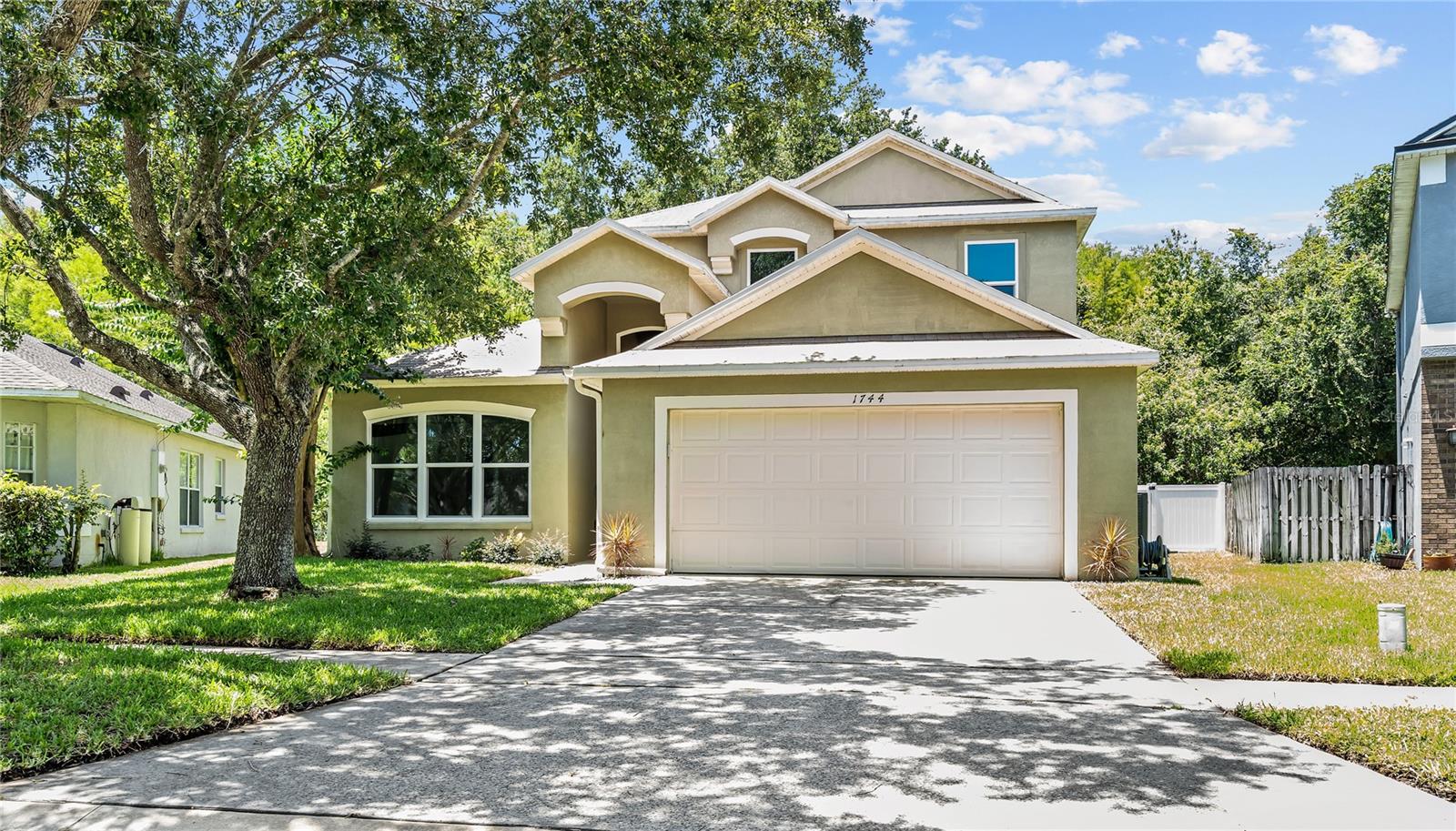 Welcome to Falcon Trace! This spacious 4-bedroom, 2.5-bath home offers over 2,500 square feet of thoughtfully designed living space in one of Orlando's most desirable communities. Featuring an open and inviting floor plan, this home provides ample room for both everyday living and entertaining. Recent updates include a remodeled kitchen, newer doors and windows, and additional exterior improvements, offering peace of mind and modern appeal. The generous primary suite provides a relaxing retreat, while the additional bedrooms have flexibility for guests, a home office, or growing households. Situated on a beautifully sized lot, residents will enjoy the community amenities Falcon Trace is known for, including a resort-style pool, playground, tennis courts, and scenic walking paths. Conveniently located near major highways, Orlando International Airport, shopping, dining, and world-famous attractions, this home offers the perfect combination of comfort, convenience, and Florida living at its finest. Some photos have digital staging.