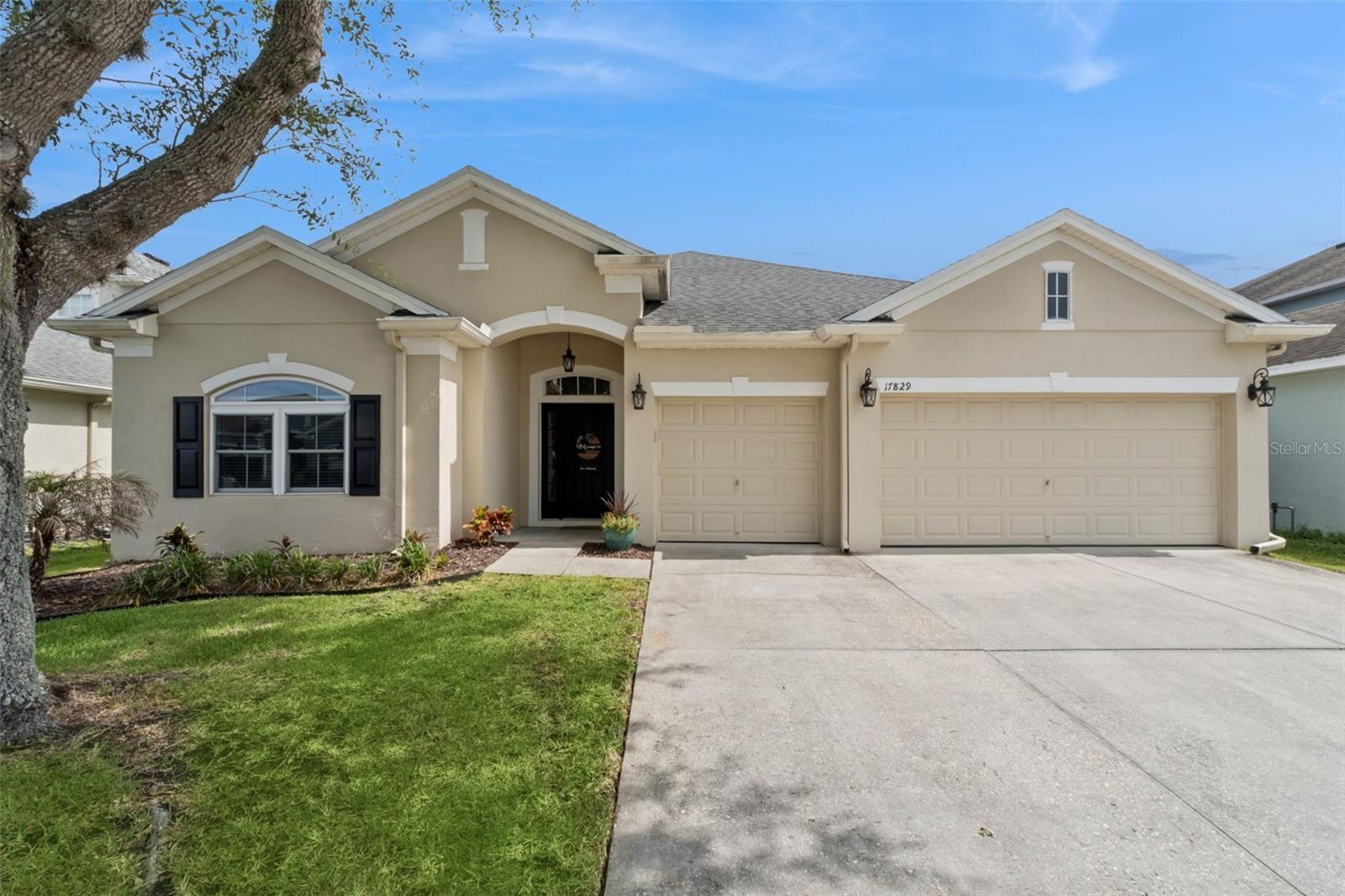 Welcome to your resort-style oasis in the highly sought-after community of Cypress Lakes! This meticulously maintained 4-BEDROOM PLUS OFFICE, 3-bathroom home showcases true pride of ownership and features one of the market's most desirable TRI-SPLIT FLOOR PLANS, offering ultimate privacy for family and guests alike. Step through the extra-wide entry hallways to find a DEDICATED FRONT OFFICE perfect for remote work, alongside a VERSATILE FLEX SPACE ideal for a formal dining room. The kitchen truly serves as the heart of the home, boasting GRANITE countertops, a center ISLAND, a peninsula breakfast bar, a corner step-in pantry, STAINLESS STEEL APPLIANCES, undermount lighting, and a TILE BACKSPLASH, all while opening seamlessly to the family room and an eat-in dinette spacious enough for a table of ten. For maximum privacy, two guest bedrooms share a full bath on one side of the home, an additional guest room enjoys a PRIVATE EN SUITE BATH in its own back corner, and the primary suite commands its own wing, complete with SEPARATE SINKS, a VANITY COUNTER, a large SEAMLESS GLASS SHOWER, and a CORNER GARDEN TUB. Step outside to relax on your SCREENED IN LANAI to watch TV and enjoy the SHADED BACKYARD, or utilize the spacious 3-CAR GARAGE for parking and extra storage. Located just 0.4 miles from the community clubhouse, you will have effortless access to resort-style amenities including a POOL WITH WATERSLIDES, lap lanes, tennis and pickleball courts, a FITNESS CENTER, and a billiards lounge. To add even more value, the WHOLE HOME SOLAR system is completely PAID OFF and TRANSFERS to the new owners, and the AC was newly replaced in 2023. This prime location zones you into the A-rated Columbia Elementary—one of the few designated Schools of Excellence in Orange County—and places you less than 5 miles from Publix, Aldi, and Walmart Grocery. With premier shopping nearby at Waterford Lakes Town Center and Oviedo on the Park, and a central location near UCF and Research Parkway, you are perfectly positioned right between Downtown Orlando and the East Coast beaches.