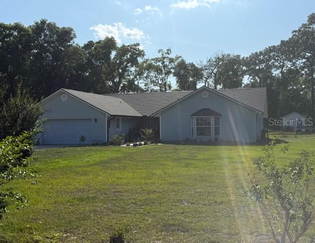 Virtually Staged. Welcome home to space, comfort, and room to grow in the county! Just outside of town. This beautiful 4-bedroom, 2 1/2-bath home is on a sprawling 1.45 acres, offering the perfect blend of privacy and everyday convenience. With plenty of room for family, guests, and entertaining, you will love the flexible layout and peaceful outdoor setting. With a functional layout and generous living areas. The home is newly renovated. Ideal for families or those needing more room. The large, spacious living room with a gorgeous fireplace. and a separate dining room. Updated kitchen and breakfast nook. The house also features a fenced-in yard, a 1-30 amp RV plug on the north side, and a 1-50 amp RV plug on the south side of the house. A shop and extra storage shed. Lots of room to keep your boats and such. Sunroom off the back and a large outdoor area for entertaining off the back porch. A new roof was installed in May 2025, and a new water heater is 6 months old, and the air conditioner is just around 5 years old. Home is right across from the county park, where family activities are held. Spend time on the trails, ride bikes, play sports, or watch. Make an appointment to stop in and see this amazing home and all it has.