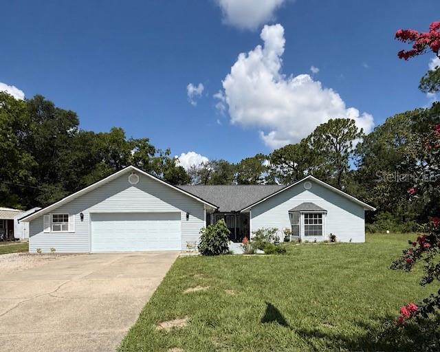 Welcome home to space, comfort, and room to grow in the county! Not far from town. Situated on a vast 1.45 acres, this lovely 4-bedroom, 2 1/2-bathroom home offers the ideal balance of daily convenience and seclusion. You will adore the home's layout and tranquil outdoor setting, with ample space for family, guests, and entertaining. There is a sizable patio and picnic area in the backyard for entertaining. With spacious living spaces and a practical design. The house has recently undergone renovations. Perfect for families or anyone who just requires additional space. The house features a separate dining area and a large, roomy living room with a vaulted ceiling and a beautiful rock, wood-burning fireplace. Updated breakfast nook and kitchen. There are high-rise toilets in every bathroom. In addition, the house has a fenced-in backyard, a 1-30 amp RV plug on the north side, and a 1-50 amp RV plug on the south side. An additional storage shed and a shop. Plenty of space for your boats, RVs, and other belongings. Possibly room for a mini farm, animals, or garden. Enjoy the sunroom that leads outback to your huge yard for entertaining. The air conditioner is only about five years old, a new water heater is six months old, and a new roof was installed in May 2025. The county park, where family activities take place, is directly across from the house. Play sports, ride bikes, spend time on the trails, or just observe. All grade schools are within a mile or so away from the house. Minutes away from the local springs and Ocala National Forest. Only 45-60 minutes away from beaches or the city of Orlando. Schedule a visit to see this incredible house and everything in it. Some pictures are virtually staged.