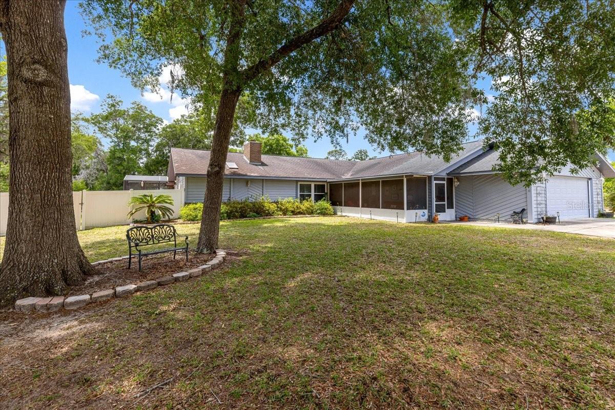 An Exceptional Opportunity for Groomers, Breeders, Trainers, or Boarding Operations

Spacious and beautifully appointed 5-bedroom, 3-bath home offering the perfect blend of comfort, functionality, and outdoor living. Nestled on fully fenced agriculturally zoned property, this versatile home provides privacy, room to grow, and endless possibilities for entertaining, hobbies, or multi-generational living.

Inside, you’ll find a warm and inviting living room centered around a stunning brick fireplace, a large formal dining room ideal for gatherings, and an oversized kitchen designed for both everyday living and entertaining. The kitchen features a gas stove, electric stove, convection oven, wine fridge, and abundant workspace for the home chef.

The flexible floor plan includes a private mother-in-law suite perfect for guests, extended family, or a home office setup. Recent upgrades include a new HVAC system installed in 2024 for added peace of mind and 1 additional mini split. Also 3 tankless hot water systems.  

Step outside to your own backyard retreat featuring a private swimming pool, screened back porch, and outdoor kitchen area ideal for enjoying Florida living year-round. The property also includes irrigation for gardening and landscaping, dog kennels, a dedicated dog run, and a separate grooming area.

Additional highlights include a whole-home generator, 500-gallon gas tank, attached 2-car garage, separate 1-car workshop, large circular driveway, three septic systems, and three RV hookups offering exceptional convenience and flexibility.

This one-of-a-kind property combines space, modern amenities, and outdoor enjoyment in a setting designed to fit a variety of lifestyles.