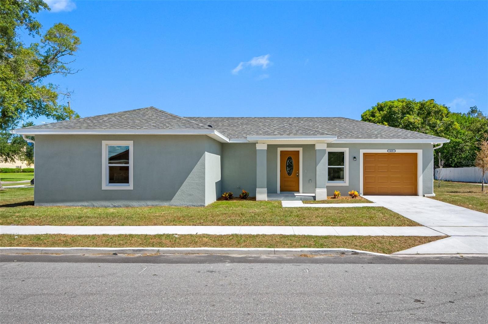 One or more photo(s) has been virtually staged. Great opportunity to own your own new home in Clearwater!  This home is available for owner occupants only.  No investors.  Income Restrictions apply.  Buyer may qualify for Down Payment Assistance.  Home was just built and has 3 bedrooms, 2 full baths, and an attached 1 car garage.  All countertops are granite.  All flooring is luxury vinyl plank.  Impact rated windows and exterior doors.  Other features include indoor laundry room, pantry, crown molding on kitchen cabinets, and tray ceiling in master bedroom.  Just under 3.5 miles from Clearwater Beach!  Bonus - this home is located next to Plaza Park, a City of Clearwater owned and maintained park with walking trail and picnic area.