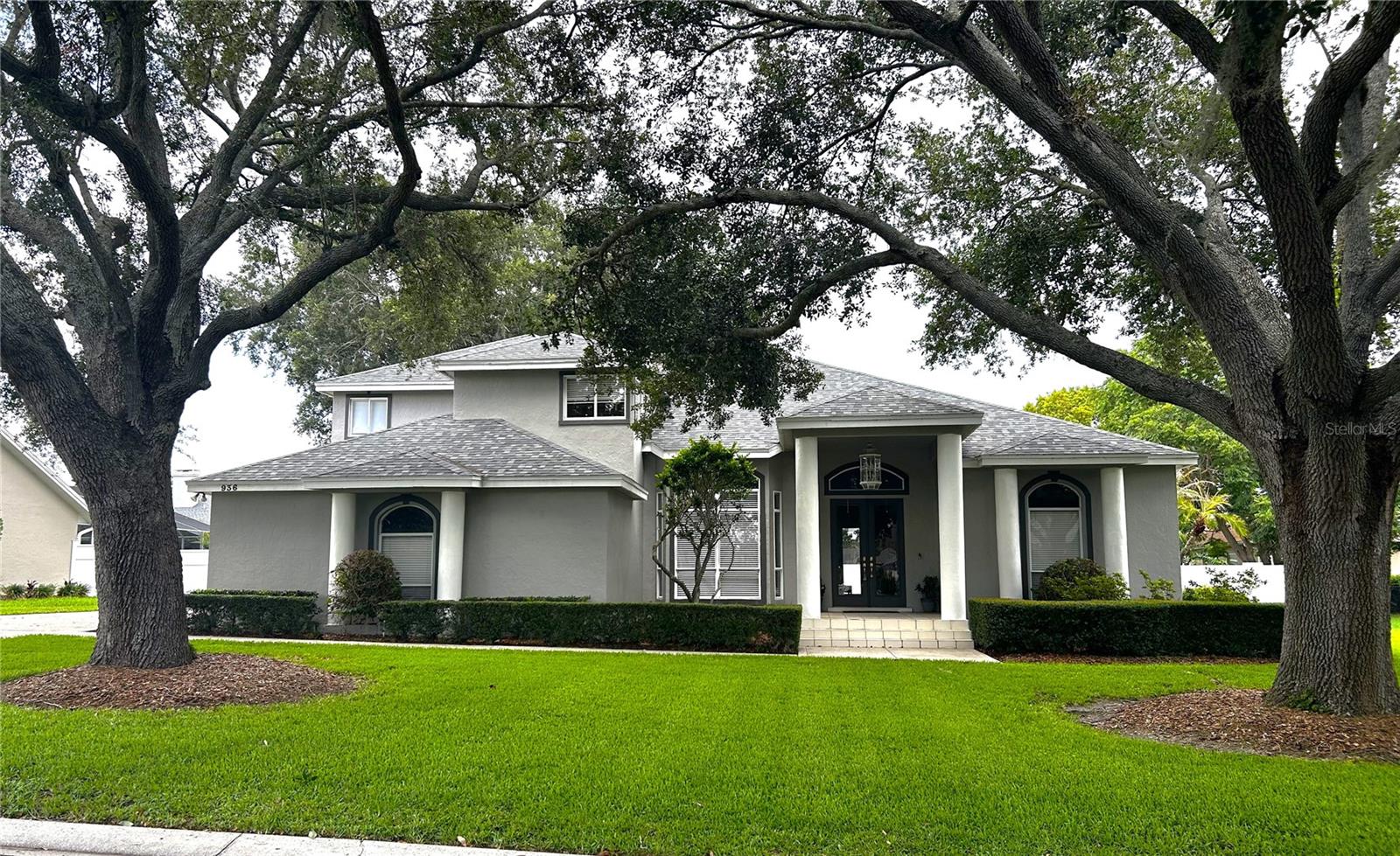 Hamilton Place- South Lakeland 5 bedroom 4 bath pool home! Over 3600 sq feet living, volume ceiling and tons of natural light. The main entrance is absolutely beautiful- through the tall French glass doors, you have a perfect view of the pool area off the living room. To the left is the den/office but could also be used as another dining room area. The stair case is stunning and you can overlook the living areas below. The Master bedroom and bath are to the right of the foyer entrance. Master bedroom has a stunning view of the pool and access as well. Master bath has double sinks, huge walk in closet, garden tub and shower.  Let's travel into the kitchen, dining and family rooms where your family can gather for all occasions. This open area can hold guest for parties and entertaining. Lots of windows that bring in natural light makes this area spacious and inviting. Off the family room is a bedroom and also a separate full bath. On the other side of the family room is a special bedroom with it's own ensuite full bath that leads to the pool area. This bedroom is currently being used as a mother in law suite. The kitchen has stainless steel appliances and new granite counters. Inside utility room is off the kitchen and has access to the garage which is oversized and has tons of storage. The upstairs has the other two bedrooms which are very roomy and they share a Jack and Jill bath.  The pool area is a dream! Pool was resurfaced  in 2022. The outside lanai is cozy and large for your cookouts and outdoor fun. Potential buyers will love the new roof which was installed in 2024 and two new HVACs installed in 2023/2024. Septic drainfield was redone in 2021. This gated community has tennis and pickleball courts for your enjoyment. Location , Location! Close to schools, shopping, restaurants and medical facilities.  Near the Polk Parkway for an easy commute to Tampa or Orlando. Come and see this beautiful spacious home!
