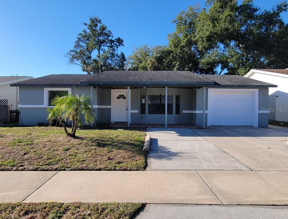 With a full-price offer, the solar panels will be paid off at closing, bringing your tax bill down and allowing the new owners to enjoy energy savings with an average electric bill of just $30 per month. A brand-new AC unit was installed 8 months ago keeping this home very cool. This spacious home offers endless possibilities and is ready for its next chapter. The primary suite features a cozy gas fireplace, a private sitting area, and plenty of room to relax. A second fireplace anchors the living room, where double doors open onto the covered back porch, creating a seamless indoor-outdoor living experience. The kitchen is designed for both everyday living and entertaining, featuring stone countertops that extend over the large island for additional seating and workspace. The home has recently passed a 4-point inspection, providing added peace of mind for buyers. Outside, the covered back porch overlooks a generous backyard with ample space for a garden, play area, or future outdoor enhancements. Move-in ready and full of potential, this home is waiting for its new owners to make it their own.