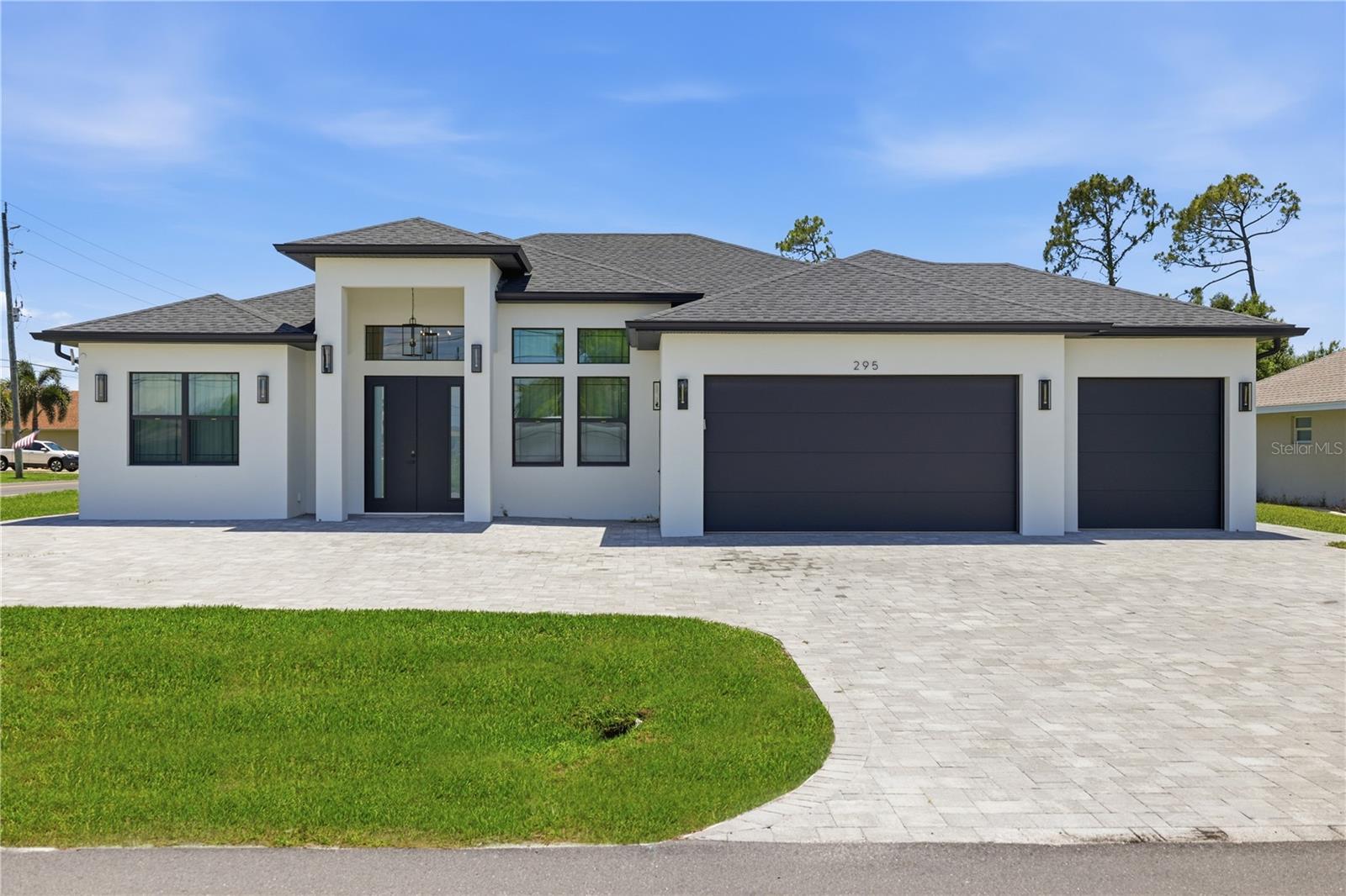 Experience luxury living in this exceptional newer construction custom home located in the highly sought-after and rapidly growing community of Rotonda West. Thoughtfully designed with both elegance and functionality in mind, this stunning residence offers 4 spacious bedrooms, 2 beautifully appointed bathrooms, and a versatile bonus room in the garage ideal for a home office, media room, or flex space. From the moment you arrive, you'll be impressed by the oversized driveway and striking curb appeal. Inside, the home showcases premium craftsmanship and upscale finishes throughout, including custom high-end kitchen, bathroom and laundry cabinetry, elegant stone countertops, top-of-the-line appliances, and designer details that elevate every space. The open-concept floor plan seamlessly blends sophistication and comfort, creating the perfect setting for entertaining and everyday living. Step outside to the expansive screened-in lanai, offering a private outdoor retreat with ample space for dining, relaxing, and enjoying Florida's year-round sunshine. Combining modern luxury, quality construction, and an unbeatable location, this remarkable home presents an outstanding opportunity to own a truly custom residence in one of Southwest Florida's fastest-growing communities. Schedule your private showing today-this exceptional property will not last long!