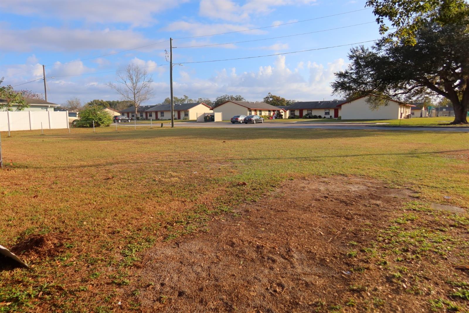 Vacant corner lot located within the city limits of Zephyrhills. Property offers convenient access to local schools, shopping, dining, and major roadways. Zoned for residential use (buyer to verify zoning, setbacks, and utilities). Ideal opportunity to build a custom home or hold as an investment in a growing area. No HOA.