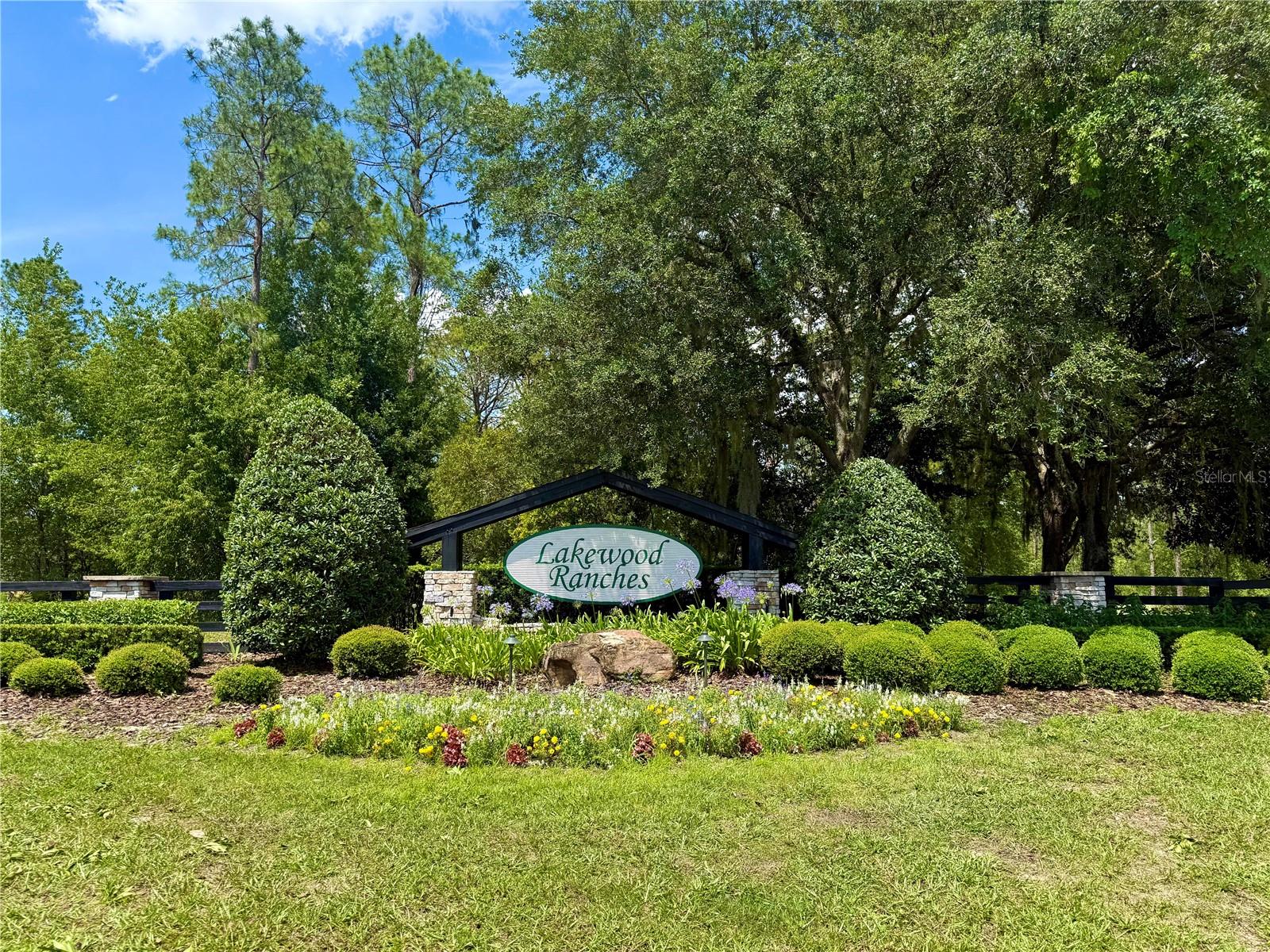 Premier 5-Acre Estate Homesite in Lakewood Ranches-Discover a rare opportunity to create your own private Florida estate on this beautiful 5-acre homesite in the sought-after Lakewood Ranches Subdivision. Offering an ideal blend of privacy, space, and flexibility, this property provides the perfect canvas for a custom residence designed around your lifestyle. With no time limit to build and the freedom to choose your own builder, you can thoughtfully plan every detail of your future home at your own pace. The community features paved roads, underground utilities, and available internet service, offering refined convenience in a peaceful natural setting. Zoning allows horses, and the minimum home size of 2,400 sq. ft. supports the creation of a spacious estate home with room for elegant indoor living, outdoor entertaining, gardens, equestrian use, or simply enjoying the open acreage. A SURVEY is available, and everyday conveniences, including nearby grocery stores, are just a short drive away. Best of all, there is NO CDD FEE. If you have been searching for acreage, exclusivity, and the freedom to build a distinctive custom retreat, this Lakewood Ranches homesite is an exceptional opportunity to bring your vision to life.
