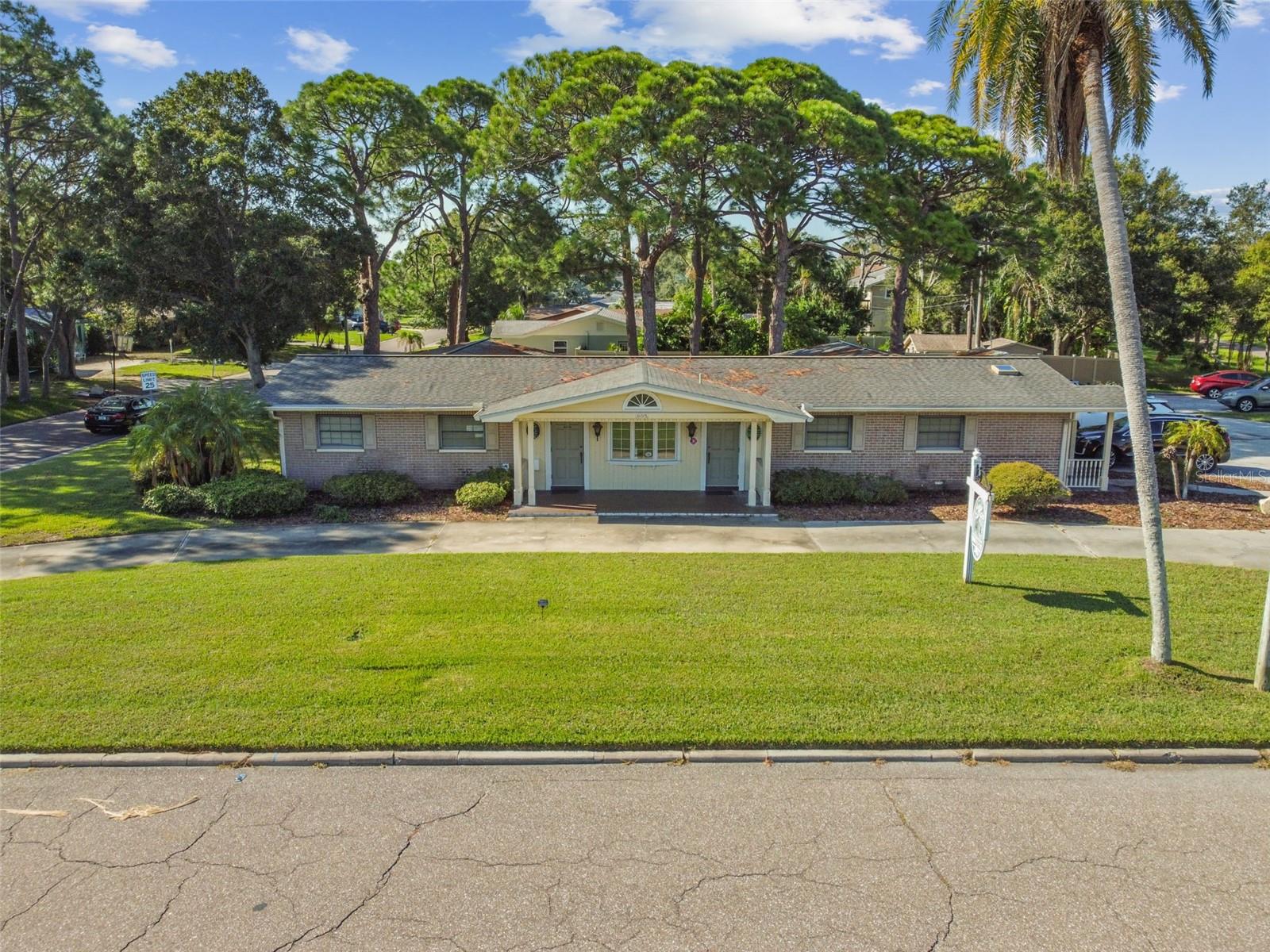 Prime Dunedin Redevelopment & Investment Opportunity - Rare opportunity to acquire a highly visible ±0.50-acre (21,714 SF) corner parcel located at the signalized intersection of Bayshore Boulevard and Palm Boulevard in Dunedin, Florida. Positioned directly adjacent to the Pinellas Trail and approximately midway between Downtown Dunedin and the Dunedin Causeway, this exceptional property offers outstanding exposure, accessibility, and redevelopment potential.
The site includes a 3,051-square-foot single-story office building with 3-bathrooms that sustained flood damage during Hurricane Helene. While the existing structure may be renovated for immediate occupancy or income-generating use, the property's greatest value lies in its redevelopment potential and flexible development opportunities.
The parcel is zoned Neighborhood Business (NB) and designated Retail & Services Limited (R&SL), allowing a variety of uses without requiring zoning or land-use changes. Potential uses include:
• Multi-family residential
• Assisted living facilities
• Bed & breakfast accommodations
• Retail establishments
• Live-work units
• Financial institutions
• Professional and medical offices
Adding to its appeal, the property sits alongside the Pinellas Trail, which attracts approximately 70,000 users per month, and enjoys exposure to Bayshore Boulevard (Alternate US-19), with traffic counts averaging approximately 20,200 vehicles per day.
Nearby amenities include Stirling Park and its golf driving range directly across Palm Boulevard, while the Dunedin Golf & Country Club is located just one-quarter mile away. The property's proximity to Downtown Dunedin, Honeymoon Island, Caladesi Island State Park, recreational amenities, and major transportation corridors makes it an outstanding investment and redevelopment opportunity.
Schedule your private showing today and explore the possibilities this premier Dunedin location has to offer.