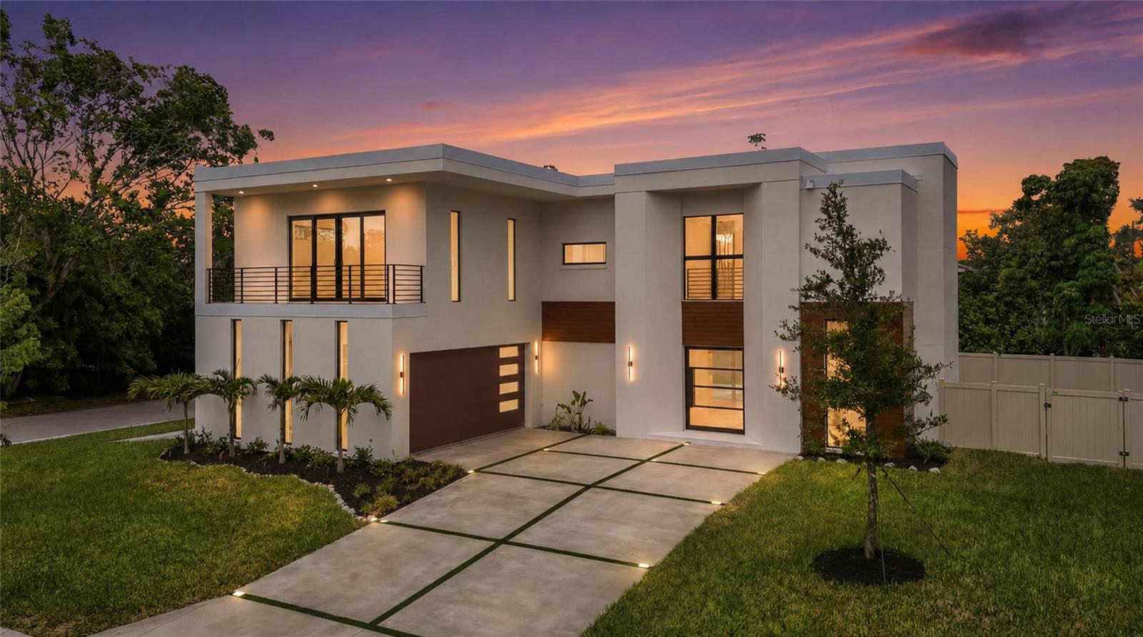 Welcome to 2604 Sydelle Street, a breathtaking custom-built residence by Fine Construction that seamlessly blends timeless elegance, superior craftsmanship, and modern luxury. Perfectly positioned on a spacious corner lot in one of Sarasota’s most desirable locations, this exceptional home offers 4 bedrooms, 4 full bathrooms, a glass-enclosed den, and 3,523 square feet of thoughtfully designed living space tailored for both everyday comfort and sophisticated entertaining.

From the moment you arrive, the home’s striking curb appeal and meticulous attention to detail set the tone for what awaits inside. Step through the custom entryway and impressive pivot door to discover an open-concept floor plan filled with natural light, soaring ceilings, and premium finishes throughout. Engineered hardwood flooring flows seamlessly from room to room, adding warmth and elegance while complementing the home’s contemporary design.

At the heart of the home is a chef-inspired gourmet kitchen, thoughtfully appointed with custom European style cabinetry, stunning Taj Mahal quartzite countertops, premium Thermador appliances, and an expansive island that serves as the perfect gathering place for family and guests. A spacious butler’s pantry provides additional storage and prep space, making entertaining effortless while maintaining a clean, refined aesthetic.

The luxurious primary suite serves as a private retreat, offering a spacious walk in shower and generous closet space designed with both comfort and functionality in mind. Each additional bedroom is thoughtfully appointed with ample space and access to beautifully finished bathrooms, ensuring comfort and privacy for family members and guests alike. The first floor den offers flexibility as a home office, media room, or guest space.

Designed to embrace Florida’s indoor outdoor lifestyle, the expansive sliding glass doors open to a spectacular outdoor living area. The custom-designed pool is the centerpiece of the backyard oasis, complemented by a fully equipped outdoor kitchen and covered entertaining space, creating the perfect setting for year round gatherings, relaxation, and enjoying Sarasota’s beautiful weather.

Additional features include a rare drive through garage, offering enhanced convenience, storage options, and flexibility for recreational vehicles or extra parking. Every detail of this residence has been carefully curated to provide a luxurious yet functional living experience.

Located in the heart of Sarasota, this exceptional property offers unparalleled access to the area's finest amenities. Just minutes from downtown Sarasota, residents can enjoy world class dining, boutique shopping, arts and cultural attractions, waterfront parks, and the pristine Gulf Coast beaches that make Sarasota one of Florida’s most sought after destinations.

This is a rare opportunity to own a truly custom luxury home in an unbeatable location. Schedule your private showing today and experience the extraordinary quality, design, and lifestyle that 2604 Sydelle Street has to offer.