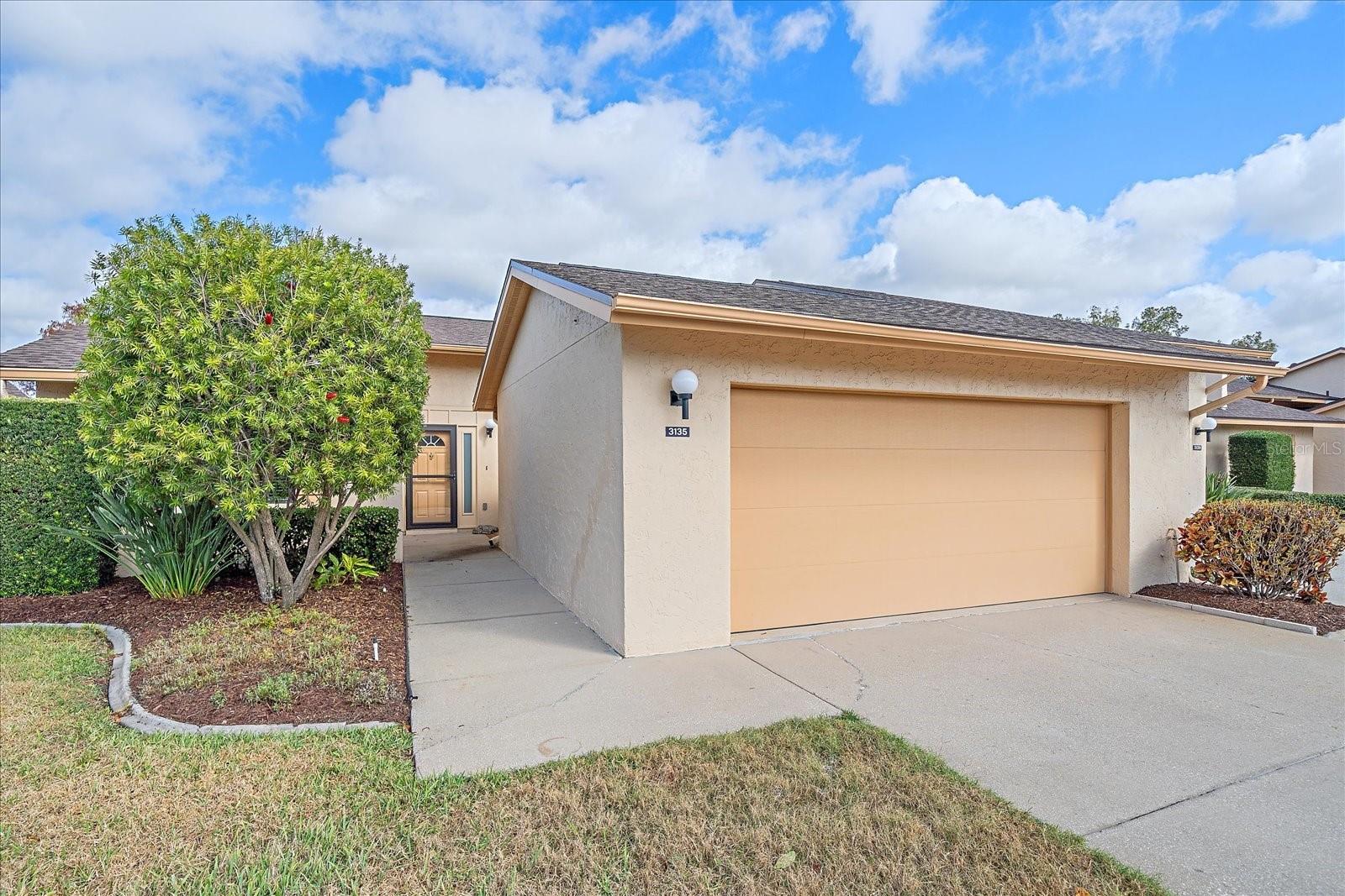 Don't miss this incredible opportunity to own a beautiful, fully furnished 2 bedroom villa in the well maintained Glen Elyn community, just minutes from downtown Sarasota and world-class beaches. This home offers a 2-car garage, with washable ceiling, and painted floors. New Hurricane Windows as well as a Hurricane-rated garage door were installed in 2017 and a Brand-new Roof in 2024. Inside you will find an open floor plan, with tile throughout the entire home. A spacious living room, welcomes you inside. The primary bathroom has been tastefully updated recently, with a custom double sink vanity, and newly tiled shower, and bathroom floor. In the kitchen you'll appreciate that the cabinet fronts have been updated, and a breakfast nook sits just off the kitchen. Enjoy a cup of coffee on the peaceful back lanai, overlooking Lake Ridge! Water heater is new in 2024 as well. Community amenities include a pool, conveniently located just steps off the rear of the home, overlooking the lake, and a clubhouse with a small library. Enjoy Maintenance-free living here in Glen Elyn, where the monthly fees include water, sewer, trash, basic cable, roof, exterior maintenance, and includes irrigation. Glen Elyn community is conveniently located, near downtown, and only minutes to several world-class beaches that Sarasota offers! This is a resident community, where no rentals are allowed. Schedule your showing today and see why this one won't last!