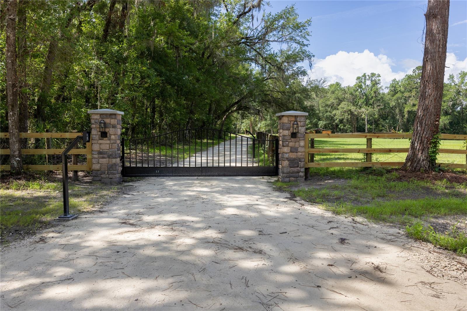 Welcome to this 12.28-Acre turnkey equestrian estate nestled within the highly desirable Farmland Preservation Area of Marion County, Florida. Tucked away at the end of a peaceful neighborhood and surrounded by elite private horse properties, this residence provides the perfect blend of luxury living, equestrian functionality, and unmatched privacy with two Gated Entrances. At this Residence you'll enjoy more horses than neighbors!

The beautiful New Pool & Spa residence offers 3 bedrooms, 2 bathrooms, and 3,346 total square feet. Built in 2000 but completely remodeled in 2026. with upgrades including a brand-new 2026 metal roof, custom designer kitchen, luxury pool and spa, elite finishes, and a stunning infinity-edge shower with custom tile work. The property has huge granddaddy oaks, towering Cedar trees, Mature Florida Pines,  Meyer lemon trees, A Mature Mulberry Tree and a relaxing waterfront creek that creates a tranquil backyard for you and your horses. Additional amenities include a heated spa, greenhouse, chicken coop, RV hookups, double gated entrances, all-new pool equipment, and a new spa heater.

Designed for any level equestrian, the property features a brand-new 4-stall barn, dedicated carriage bay, new paddocks, tack room, storage area, and a hot/cold horse wash rack with its own filters and water heater. A horse carriage is included with the sale. The estate is fully positioned among some of Marion County's most prestigious equestrian properties, offering great security and a premier horse-country setting.

Conveniently located approximately 20 miles from the World Equestrian Center and University of Florida, and just minutes from the Ocala Jockey Club, this property offers easy access to world-class equestrian venues, veterinary services, training facilities, and championship competition. Whether you're an equestrian enthusiast, trainer, breeder, or simply seeking a private luxury estate, this property delivers a lifestyle few can match. The property is a complete gem! Vacant and Easy to show.