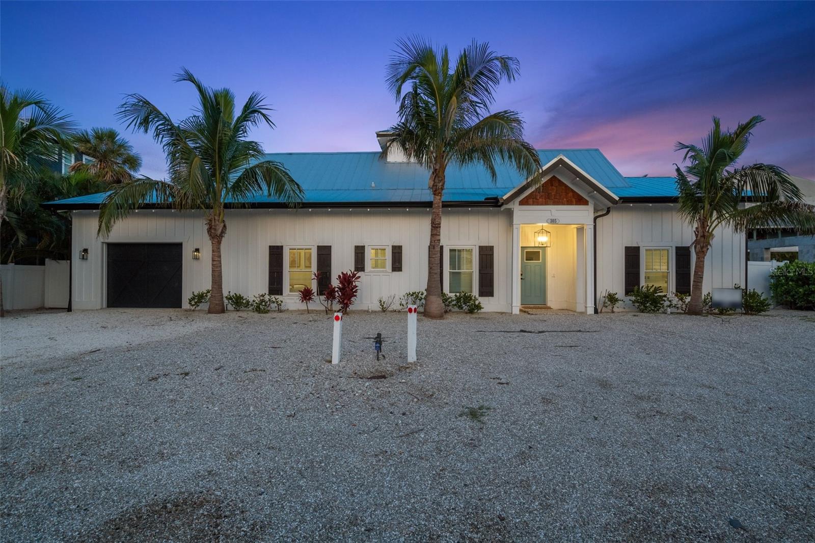 Start your island getaway here at our newly refreshed coastal home in a charming neighborhood of Holmes Beach! This gorgeous, modern four bedroom, three bath retreat is a short walk to the glistening sandy beaches of the Gulf! An open layout with chic-boho furnishings, serene hues, a private pool, and state of the art appliances throughout. You’ll love the proximity to local restaurants, boutiques, and how bike friendly the island is. Cruise the bike paths or rent a golf cart to explore the island. Venture over to the North End by the free AMI Trolley, where you have the infamous Pine Ave, that has one of a kind shops and cafes. Island living at its finest! Nothing feels more tropical than arriving to a home where the streets are dotted with beautiful swaying palm trees. Step inside to the immaculate space that has all the cozy comforts to make your tropical dreams come true. The living room features plush sofas and modern chairs where you can kick back and watch a show on the mounted flat screen. The chef’s kitchen is complete with quartz counters, custom cabinets, stainless steel appliances, and a dining table to enjoy a home cooked meal with the family. The four bedrooms provide pure comfort with luxury bedding and natural wood elements that enhance the calm ambiance. The master suite features a king bed with an ensuite bathroom that has a freestanding soaking tub, glass walled step-in shower with wood flooring, and dual quartz vanities for a spa-like experience. In the other 3 dreamy bedrooms you have king beds in two of the rooms and your last bedroom highlights a full over full bunk bed that is popular for the younger crew in tow.