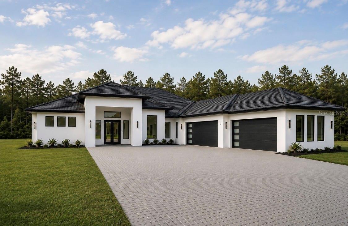 Under Construction. Welcome to a new standard of luxury living in Wedgefield, where everyday life feels like a private resort. Situated on a beautiful one-acre homesite with no wetlands and no HOA, this exceptional new construction home is thoughtfully designed around the Florida lifestyle. The resort-inspired backyard features a sparkling swimming pool, expansive covered lanai, fully equipped outdoor kitchen, oversized paver terrace, and dedicated artificial turf sun lounge, creating the perfect setting for entertaining, relaxing, and enjoying year-round outdoor living. 

Inside, this thoughtfully designed 4-bedroom, dedicated office, 3.5-bath residence features a true 4-car garage, an impressive 100-foot driveway, soaring ceilings, and an open-concept floor plan that blends elegance with everyday functionality.

The spacious great room is anchored by a dramatic floor-to-ceiling stone fireplace with custom built-in cabinetry and shelving, while a 16-foot sliding glass door fills the home with natural light and creates a seamless indoor-outdoor living experience.

At the heart of the home, the chef-inspired kitchen showcases Taj Mahal quartz countertops, custom designer cabinetry, an oversized center island, premium ZLINE Autograph appliances, and a true walk-in butler's pantry complete with custom cabinetry, abundant storage, and a dedicated prep area. A custom wine and bar feature adjacent to the dining room creates another elegant focal point for entertaining.

The private primary suite serves as a luxurious retreat with dual walk-in closets and a spa-inspired bathroom featuring an oversized wraparound shower, and refined designer finishes. Calacatta Oro quartz continues throughout the secondary bathrooms, creating a cohesive, high-end finish palette.

Every detail has been thoughtfully curated, from the soaring ceilings and custom fireplace to the designer kitchen, butler's pantry, premium quartz selections, and exceptional indoor-outdoor living spaces. Combined with the privacy of a one-acre homesite and the freedom of no HOA, this home delivers a level of luxury and craftsmanship rarely found in Wedgefield.

Ideally located just 15 minutes from Lake Nona and Orlando International Airport, approximately 30 minutes from Downtown Orlando and Central Florida's world-famous attractions, and 30–40 minutes from the Space Coast beaches, this home offers the perfect balance of privacy, convenience, and luxury.

This is more than just a new construction home...it's a thoughtfully designed luxury residence built for the way people truly want to live.

Renderings are artist's conceptual representations and are provided for illustrative purposes only. Final construction, finishes, materials, colors, dimensions, and features may vary.