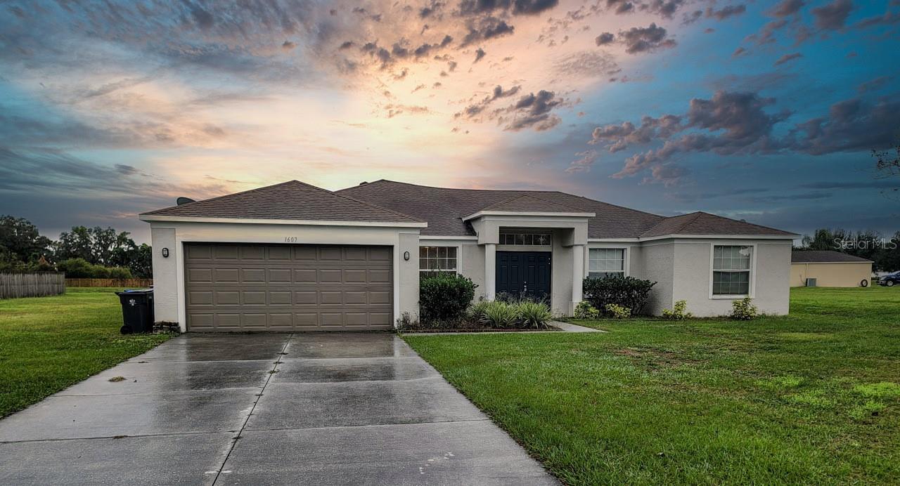 Available ASAP. This beautiful Avondale Groves 5 bedroom, 3 full bathroom, 1.21 acre oversized lot home is move-in ready! As you enter, the large windows throughout helps to bring in loads of daylight. The separate formal dining and living rooms are ideal for entertaining and gatherings. The kitchen features ample counter space, bar top, closet panty, all appliances, and beautiful cabinetry. The primary bedroom has space for a king size bed with a huge walk-in closet and an en-suite bathroom complete with double sink vanity, standalone shower, and soaking tub. All rooms within this split bedroom floorplan home are a sizeable with ample closet space. Two of the secondary bedrooms even share a jack and jill bathroom for convenience. Plus the 5th bedroom could also be used as an office/den/play area. You can keep your car or storage items protected in the large two car garage. The sliding glass doors from the family room lead out to the oversized 1+ acre yard with expansive open land and pond views. The quiet Avondale Groves gated community is known for its great rural location, nestled away from road noise but within minutes of everyday conveniences. Plant City is conveniently located near SR-60, New Tampa Hwy, and I-4 for a quick commute to Tampa and Lakeland. Easily accessible restaurants, schools, shopping, and parks makes this location ideal! Schedule your private showing today before its gone!