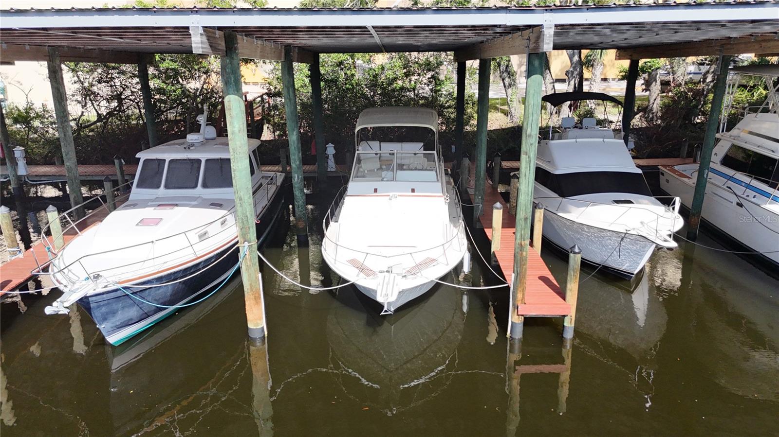 A rare find in Sarasota, this covered 50ft wet slip at Osprey Harbor Village offers the perfect blend of protection, convenience, and value. Located at 480 Blackburn Point Road in Osprey, just off the Intracoastal Waterway, this sheltered slip keeps your yacht out of the Florida sun with quick access north to Sarasota Bay or south to Venice and the Gulf of Mexico beyond. Enjoy the benefits of ownership without the million-dollar price tag of waterfront real estate, complete with water, electric, cable, pump-out services, a fuel dock, on-site restaurant, and secure, well-lit docks. Low quarterly fees make this an exceptional opportunity for any serious boater or investor!
