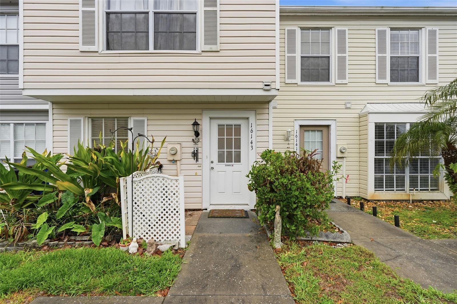 Virtually Staged. Move-In Ready Townhome in Prime Northdale Location!

Welcome to this beautifully updated 2-bedroom, 2.5-bathroom townhouse in the highly sought-after Northdale area of Tampa, offering 1,184 sq ft of thoughtfully designed living space.

Step inside to find a bright, open-concept layout featuring durable tile and vinyl plank flooring, fresh interior paint, and updated lighting throughout. The spacious living and dining areas flow seamlessly into the kitchen, complete with bar seating—perfect for entertaining or everyday living. A convenient half bath downstairs adds functionality for guests.

Upstairs, you’ll find two generously sized bedrooms, each with its own private bathroom, ample closet space, and built-in storage—ideal for privacy and comfort. Recent upgrades include new flooring, modern fixtures, and ceiling fans, giving the home a fresh, contemporary feel.

Enjoy Florida living outdoors with your private, paved patio and vinyl fencing, perfect for relaxing or hosting. Additional features include in-unit laundry, extra storage, assigned parking, and guest parking.

Major updates include a NEWER ROOF (2023), offering peace of mind for years to come.

The community features a pool and well-maintained grounds, with a low HOA that covers exterior maintenance and landscaping, making ownership easy and stress-free.

Ideally located just minutes from shopping, dining, parks, top-rated schools, and major highways, this home offers both convenience and lifestyle.

Whether you're a first-time buyer, investor, or looking to simplify, this Northdale gem checks all the boxes. Schedule your private showing today!