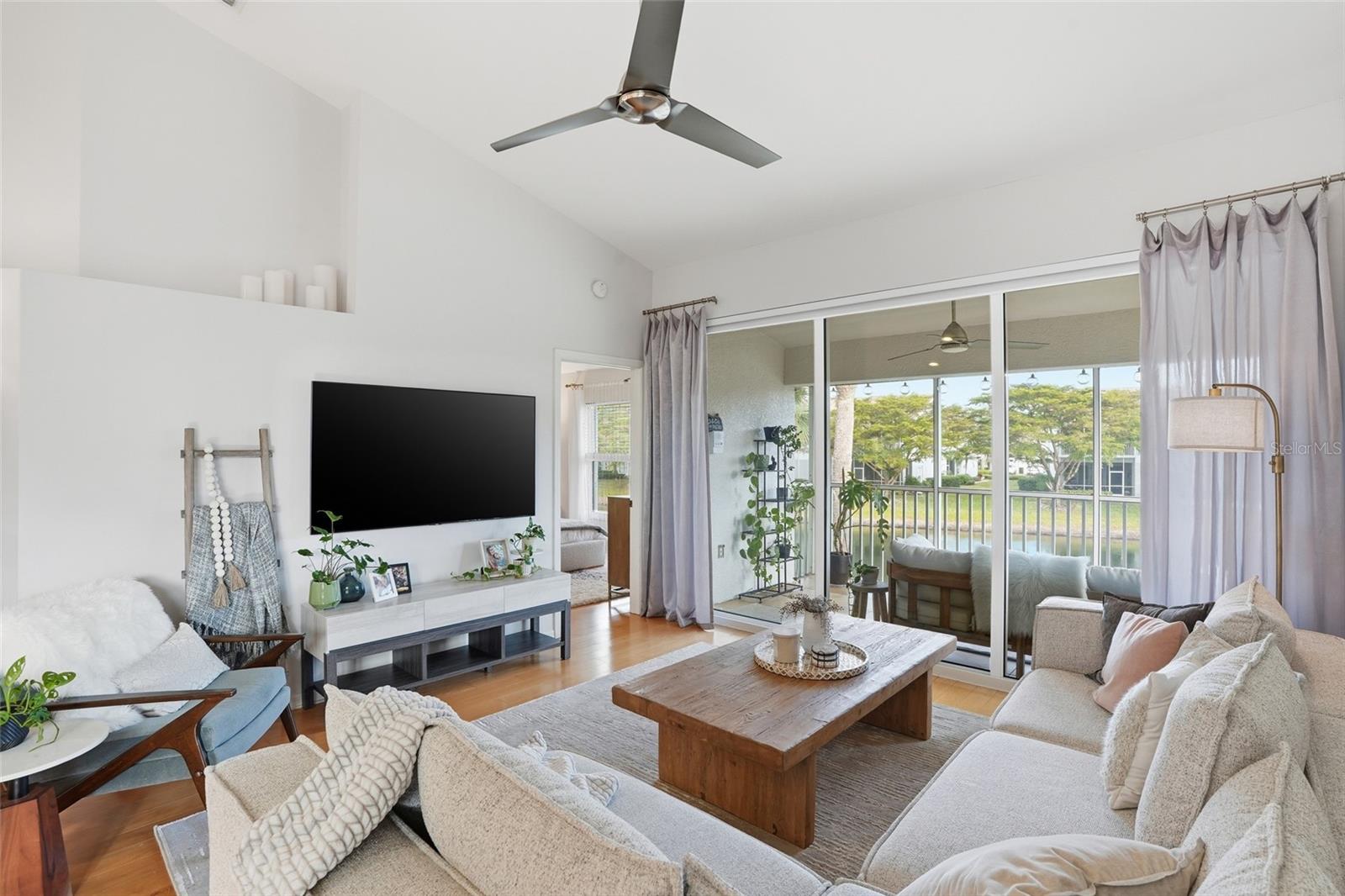 This inviting second-floor residence offers a comfortable blend of style, light, and easy Florida living within a well-maintained condominium community. The interior features a thoughtfully designed layout that feels open yet defined, with generous living and dining areas that flow naturally for everyday living and entertaining. Large windows and glass doors allow natural light to fill the space, creating a bright, airy atmosphere throughout, while neutral finishes provide a clean backdrop ready for personal touches. The kitchen is practical and welcoming, designed for both casual meals and more formal gatherings, and the bedrooms offer privacy and comfort with ample storage. The AC unit was recently replaced. A screened outdoor space extends the living area, ideal for enjoying peaceful mornings or relaxing evenings while taking in the surrounding greenery. Residents enjoy access to a range of community amenities and the convenience of being close to shopping, dining, beaches, and all that North Naples has to offer, making this property an excellent choice for a primary residence or seasonal retreat.