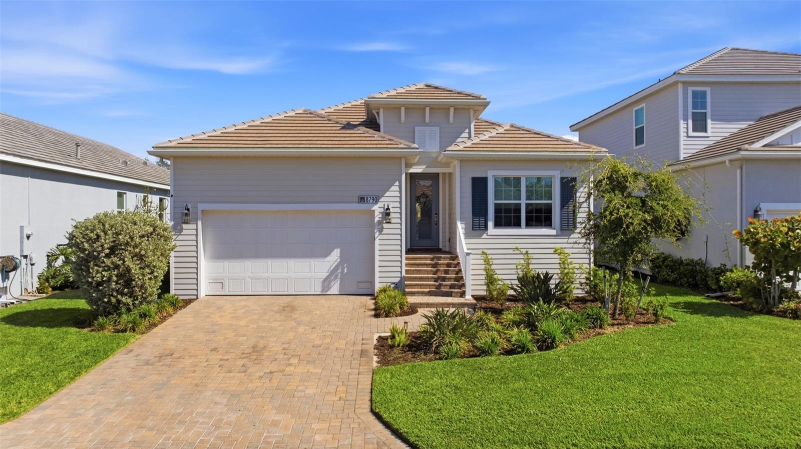 Beautifully crafted newer pool home where thoughtful design meets custom elegance in the gated community of Tide Marsh. Elegant details such as crown molding, tray ceilings, and custom shiplap accents that set a sophisticated yet inviting tone throughout the open living spaces. The heart of the home is a beautifully appointed chef’s kitchen, showcasing quartz countertops and big island, stainless steel appliances, a gas range, and a walk-in pantry with solid wood shelving. Designed with comfort and privacy in mind, this 4 bedroom, 3 full bathroom layout features thoughtfully separated living wings, offering an ideal retreat for both owners and guests. The primary suite is complete with dual walk-in closets, a spa inspired bathroom with dual vanities, and an oversized walk-in shower. Push back the pocket slider doors and retreat to a custom heated, saltwater pool and unwind on the sun shelf, enjoy the soothing waterfall, or entertain under the spacious screened lanai with a large covered area ready for an outdoor kitchen. Additional highlights include timeless tile flooring in the main living areas, plush carpeting in the bedrooms, a dedicated laundry room with utility sink, hurricane impact windows and doors, designer window treatments, and a spacious two-car garage with epoxy flooring and ample storage. Nestled within the intimate, gated Tide Marsh community of just 63 homes, residents enjoy a low maintenance lifestyle with lawn care included, along with sidewalks, streetlights, underground utilities, and a golf cart friendly setting. Tucked away for privacy yet ideally located just minutes from pristine beaches, upscale shopping, dining, and the best of Fort Myers.