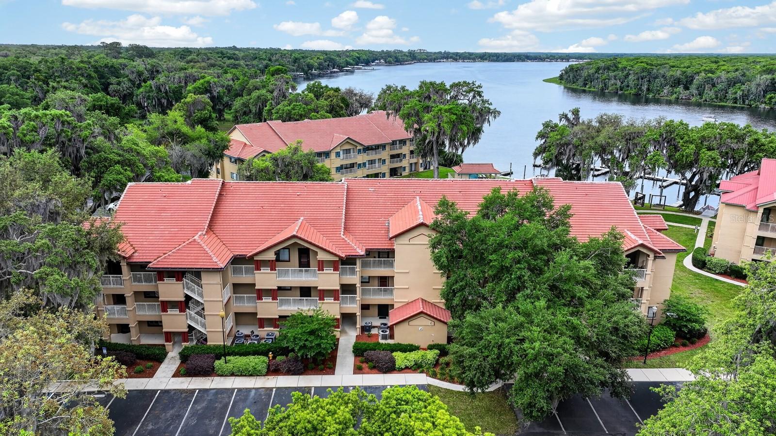First-floor unit with breathtaking river views! Don’t miss this opportunity to own a 2-bedroom, 2-bathroom condo in charming Welaka along the St. Johns River. This approximately 1,168 sq. ft. unit features a deeded boat slip and stunning sunset views from the private porch overlooking the water. Located in Flood Zone X (not in a high-risk flood area) and approved for short-term rentals (1-week minimum), this property is ideal as a full-time residence, vacation getaway, or income-producing investment. Enjoy boating, fishing, skiing, or simply relaxing while embracing the peaceful waterfront lifestyle. Schedule your showing today—this one won’t last!