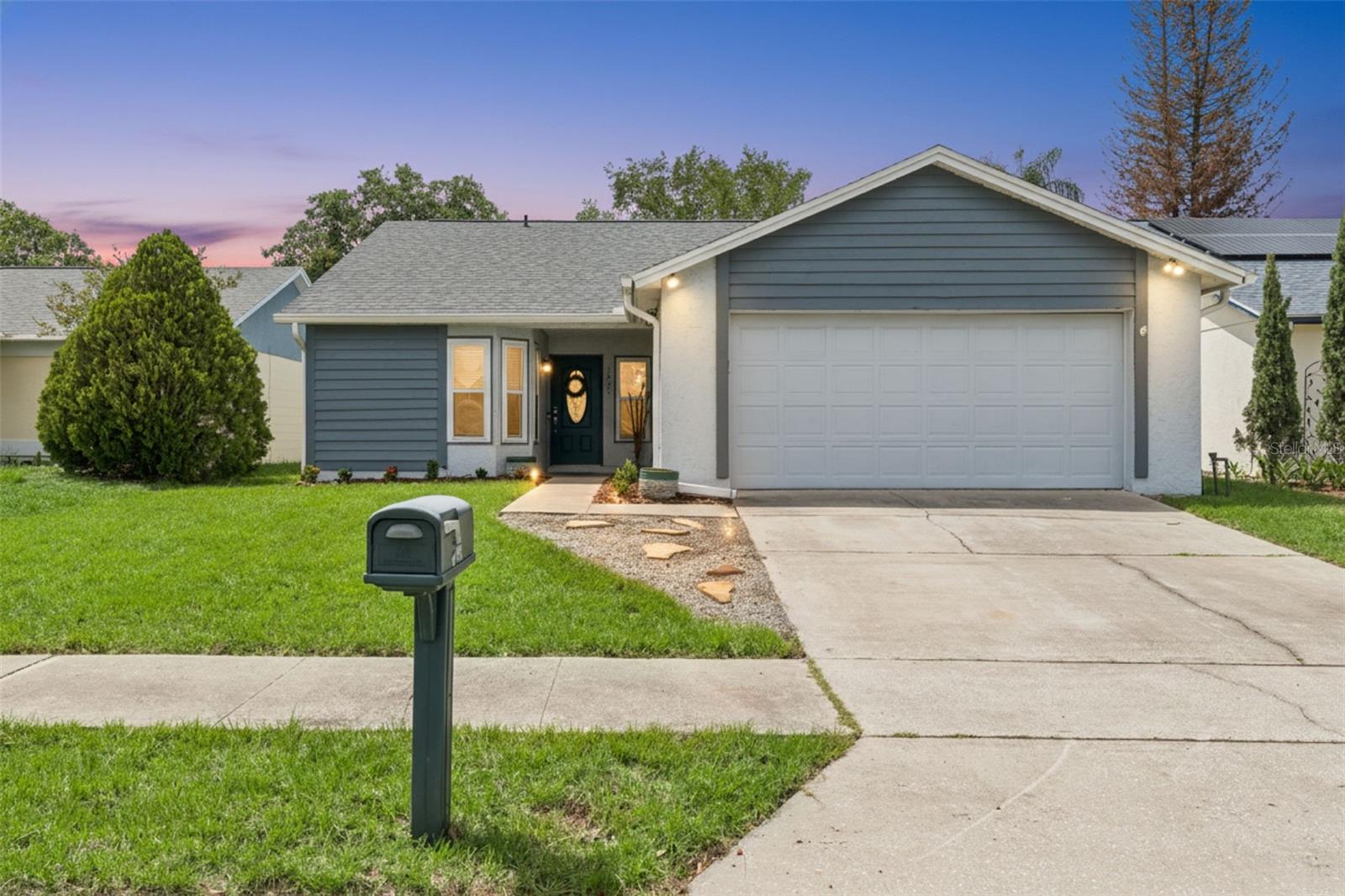 Welcome to this beautifully updated Oviedo home located in a highly desirable community served by top-rated Seminole County schools. With more than $33,000 in improvements completed over the last four years, this move-in-ready property offers the perfect blend of comfort, style, and functionality.

Step inside to an open floor plan with soaring ceilings and a spacious great room featuring vaulted ceilings, newer French doors with built-in blinds, and plenty of room for large furniture arrangements. The flexible layout provides endless possibilities for today's lifestyle.

The spacious kitchen is designed for both everyday living and entertaining, featuring a glass cooktop, convection oven, stainless range hood, closet pantry, breakfast bar pass-through to the family room, and a bright informal dining area with corner windows that fill the space with natural light. A brand-new three-door stainless steel refrigerator (2026) is included.

The formal dining room offers exceptional flexibility and can easily serve as a home office, den, playroom, or potential fourth bedroom. The convenient indoor laundry area includes a washer and dryer purchased in 2025 and is located near the bedrooms in a large dedicated closet with shelving and lighting.

The primary suite features a large walk-in closet and an updated en-suite bath with a beautiful tiled walk-in shower. Additional recent updates include a new roof (2020), HVAC system (2019), windows (2021), exterior paint (2026), water heater (2026), refrigerator (2026), washer and dryer (2025), and garage door opener (2025).

Step outside to your private backyard paradise. Enjoy Florida living year-round on the expansive 25' x 13' screened patio, plus an additional open patio perfect for grilling or soaking up the sunshine. The professionally landscaped yard features a $7,000 retaining wall, new front-yard sod, Wi-Fi-controlled irrigation system, and premium DelaTurf Premium Grade pet-friendly artificial turf throughout the backyard. Surrounded by vinyl fencing, this outdoor retreat offers exceptional privacy and low-maintenance enjoyment.

Don't miss this opportunity to own a beautifully updated home in one of Oviedo's most sought-after locations!