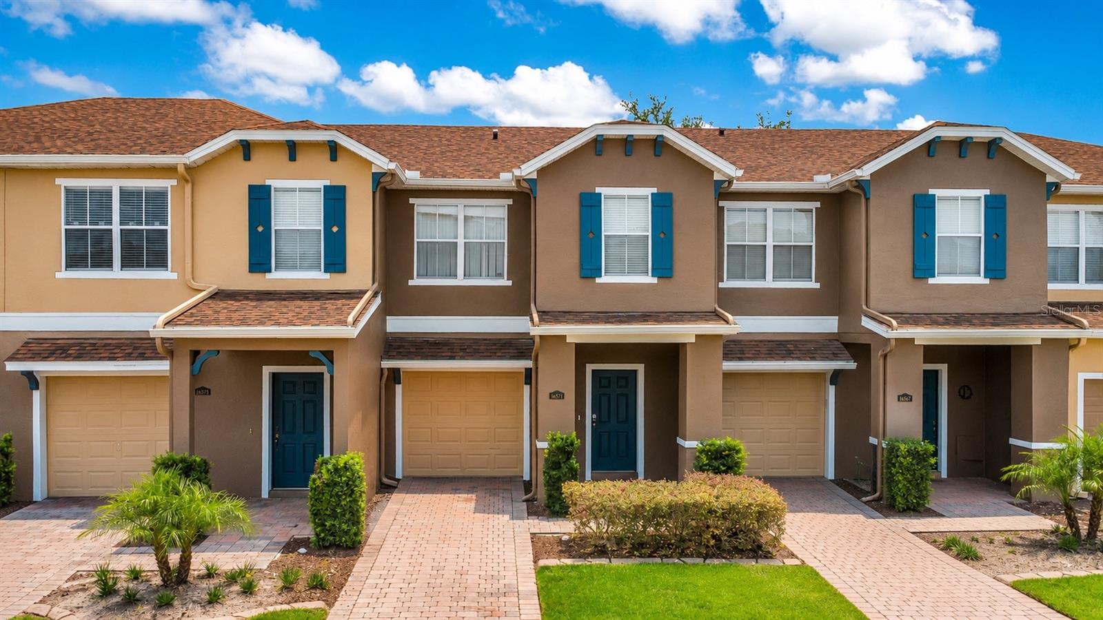 Welcome to a move-in-ready 2-bedroom, 2.5-bath townhome in the gated Timber Springs at Avalon Park community. Enjoy peaceful pond views, illuminated fountain lights, and beautifully manicured landscaping right from your living and dining areas. The spacious floor plan features engineered hardwood flooring throughout the foyer, living room, and dining room, along with all-new interior paint and a new HVAC system. The well-appointed kitchen overlooks the pond and offers a breakfast bar, pantry, modern backsplash, Corian countertops, beautiful 42-inch cabinetry, and matte slate stainless steel appliances. Upstairs, you’ll find two oversized primary suites, each with its own en-suite bathroom and large walk-in closet. The convenient upstairs laundry room includes a Maytag washer and dryer. A half bath downstairs, newer modern light fixtures add thoughtful finishing touches throughout the home. Outside, a brick-paver driveway and one-car garage complete the package. The HOA has recently painted the exterior, and the community received a new roof in 2024 for added peace of mind. Residents enjoy access to a community pool, new playground, tennis courts, and basketball courts. Conveniently located just minutes from SR 417, SR 408, UCF, and Waterford Lakes Town Center. Be sure to check out the 3D tour and come see why this townhome is easy to love.