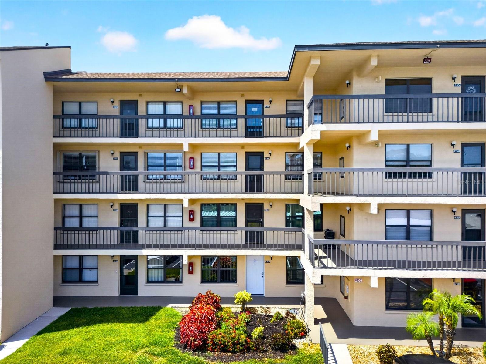 This beautiful 2-bedroom, 2-bath turnkey condo is located in the 55+ gated Woodpark community—often described by residents as a “hidden gem.” The unit is nestled in one of the quietest and most scenic areas of the subdivision and features a screened balcony with tranquil views of lush greenery. The dining area is conveniently located off the kitchen and flows seamlessly into the inviting living room, creating an open and cohesive living space. The oversized primary suite easily accommodates a king-size bed and includes a private bath with a walk-in shower and a spacious walk-in closet. The split-bedroom floor plan offers excellent privacy for guests, with a second bedroom that can also be used as a home office. A second full bathroom with a bathtub is accessible from the hallway, adding both convenience and privacy. The condo is offered fully furnished with stylish, comfortable décor. Additional features include a private washer and dryer, a 4x4 storage space ideal for seasonal items and beach gear, and a covered carport conveniently located near the elevator. Woodpark offers resort-style amenities including a large heated pool, clubhouse, wooden deck with shaded tables, barbecue area, shuffleboard, and walking trails. The pet-friendly community’s HOA fee includes cable, internet, water, sewer, trash, and all amenities—owners only pay for electricity. Conveniently located near shopping and dining, this condo is just a short drive to the stunning beaches of Anna Maria Island. Sarasota’s famous St. Armands Circle is also nearby, offering upscale shopping and vibrant nightlife after a relaxing day at Lido Beach. Living at Woodpark truly feels like a year-round vacation in a peaceful, resort-like setting.