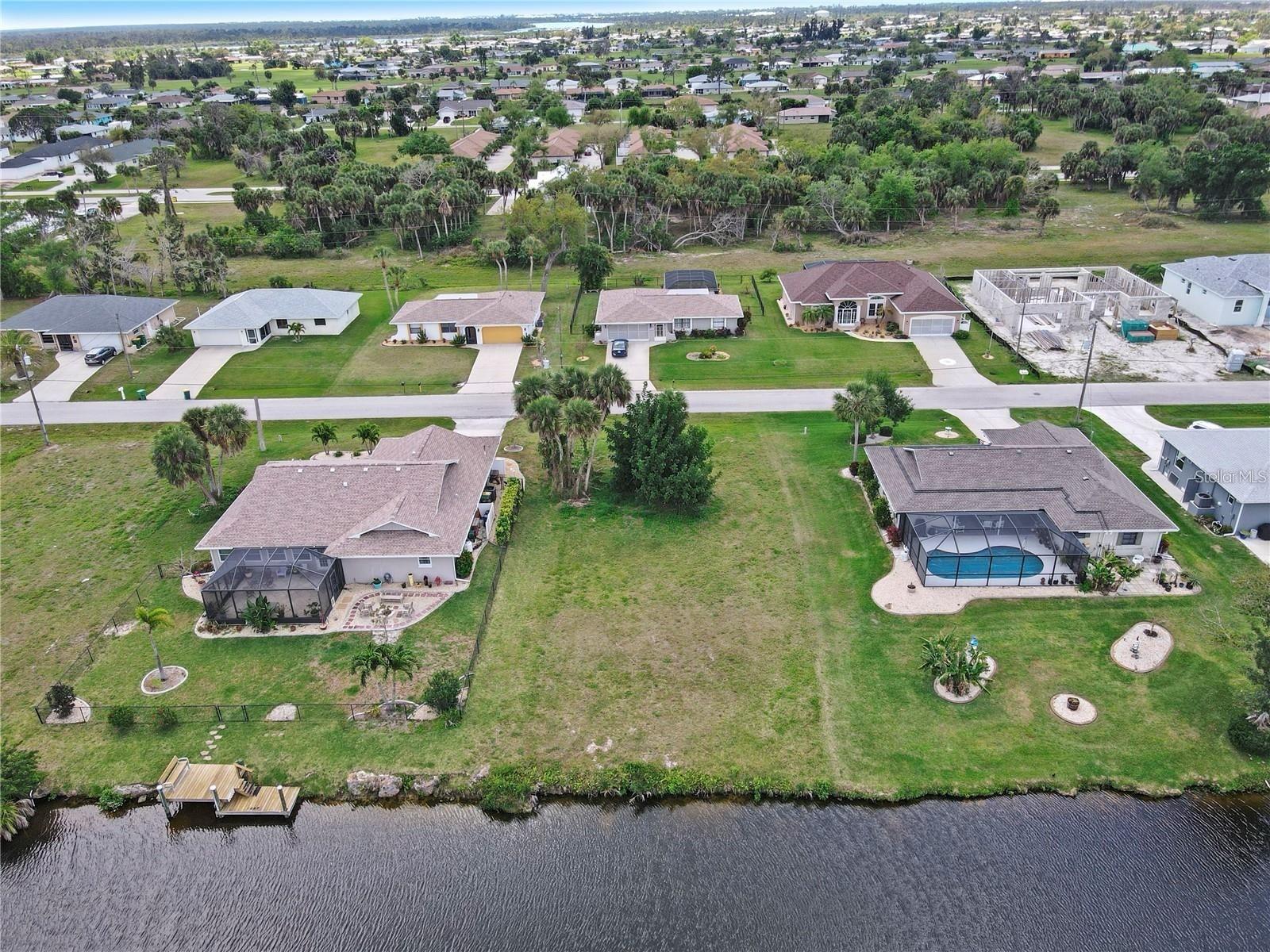 Ready to Build your Dream Home? This WATERFRONT Lot is Priced to Sell. Fantastic Location in the Fast Developing Deeded Golf Community of Rotunda West. Public Water, Sewer and Electric Available. Close to World Class Beaches, Fishing, Shopping, Dining, and Everything you need to live the Florida Lifestyle.
