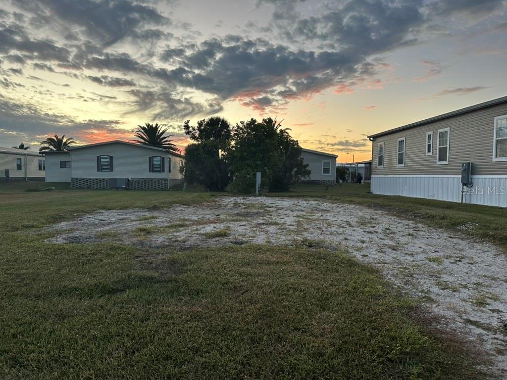 Build your Florida home on this well-located interior lot directly across from the recreational area in the popular 55+ waterfront community of Harbor Cove. Enjoy convenient access to community amenities while maintaining a comfortable residential setting. This lot offers an excellent opportunity to design and build a home that fits your lifestyle, with building packages available to simplify the process. Harbor Cove features a marina with optional dock space, clubhouse, swimming pool, fitness center, and an active social calendar. Ideally located near shopping, dining, beaches, and downtown Venice, this property is well suited for seasonal or year-round living.