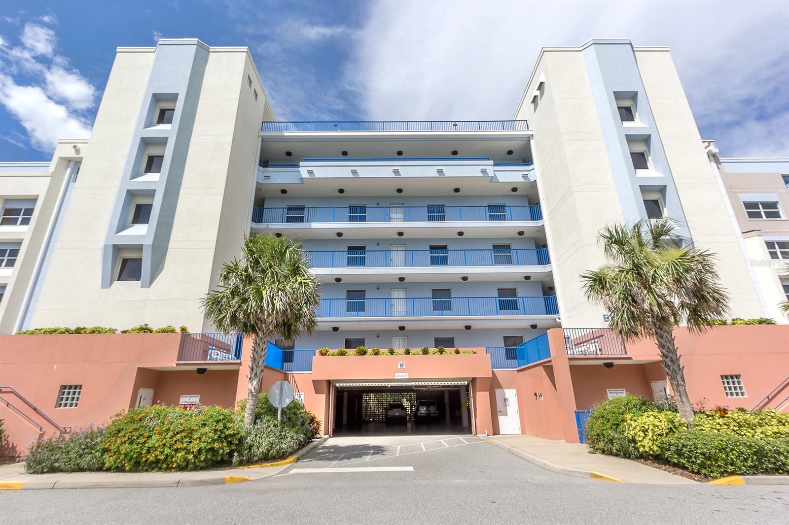 One of, if not the nicest end units offered in the well known resort ocean side community in New Smyrna Beach called Ocean Walk. Building 19 is so desired because it is on the south end of the entire community and this particular unit is a south end unit with (no) buildings next to you on that end, so clear unblocked views to the South. This large 5th floor (END) unit offers blue ocean water views from both the main living area and balcony, as well as the guest rooms and kitchen window. The 5th floor also offers the tallest ceilings as the 5th floor ceilings are taller than the other floors, 3 large bedrooms, and a large open kitchen. This floor plan is one of the most popular as there are two private balconies. Most of the furniture will convey with accepted offer. The best of both worlds offered here. Located perfectly, near beach access, the pool areas, amenities and the main south gate entrance. The master offers a large walk-in closet and a jetted tub. The flooring in the main areas is tile, the ac is new. Only the end units come with the extra large storage rooms on each floor. Ocean Walk offers 24 hour gated community with 2 large pools, tennis courts, basketball courts, indoor theater room, under building parking with elevators from the garage directly to your floor, miles and miles of nature and walking trails, access to the river for kayaking and/or paddle boarding, Located on the no drive beach section. All information is intended to be accurate but not guaranteed. ;Water: City