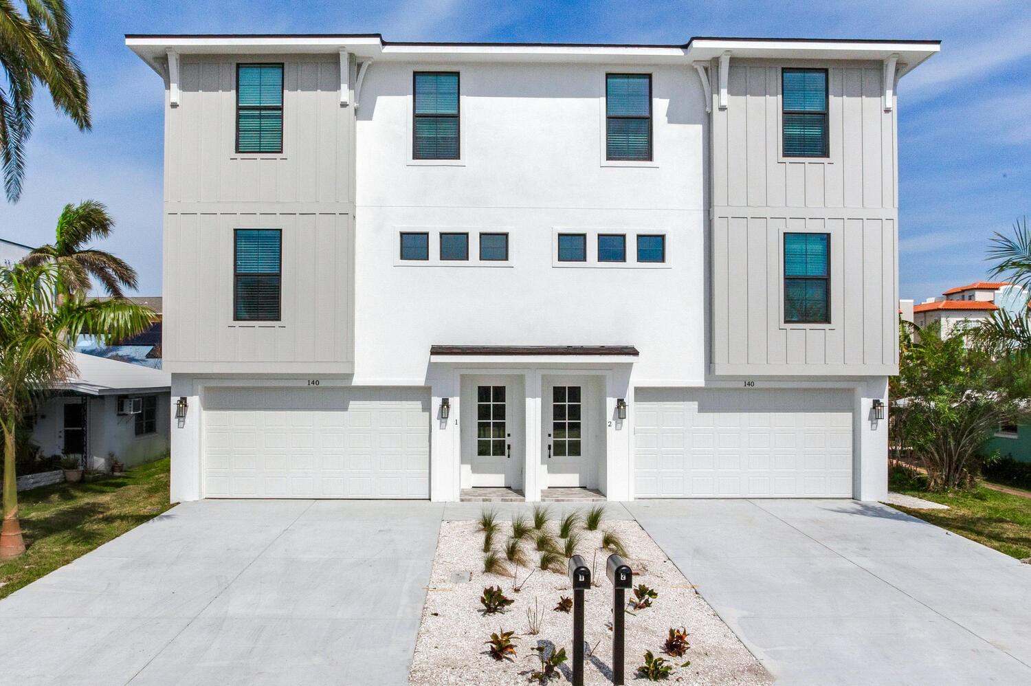 Built in 2024 with meticulous attention to detail, this beachside townhome delivers true luxury living just moments from the shoreline. Thoughtfully curated furnishings and decor add to the value of this home. Volume ceilings and natural light frame a spacious great room that integrates a chef’s kitchen with premium appliances, sleek cabinetry, expansive prep space, an entertainer’s dream. The flexible four-bedroom layout is anchored by an exceptional owner suite featuring a grand double-door entry, private balcony, generous walk closet, and a spa-inspired ensuite with a large walk-in shower. Outdoor living extends across multiple balconies, while the oversized garage accommodates up to four cars and still leaves room for a workshop, gym, or media den. Every finish has been curated for quality and longevity, from the flooring and fixtures to the hardware and lighting, creating a refined coastal retreat where comfort, style, and convenience actually get along for once.