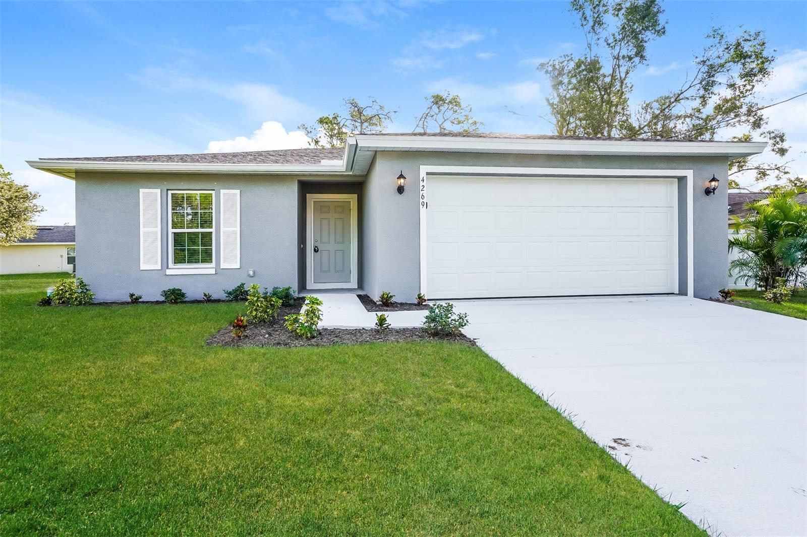 Step into this beautifully maintained 4-bedroom, 2-bath home featuring an open-concept layout with spacious living and dining areas. The kitchen offers stainless steel appliances, and a large island perfect for entertaining. The owner’s suite includes a walk-in closet and a private bath with dual sinks and a walk-in shower. Enjoy durable vinyl plank flooring throughout, as well as ceiling fans in all the bedrooms. Move in ready!