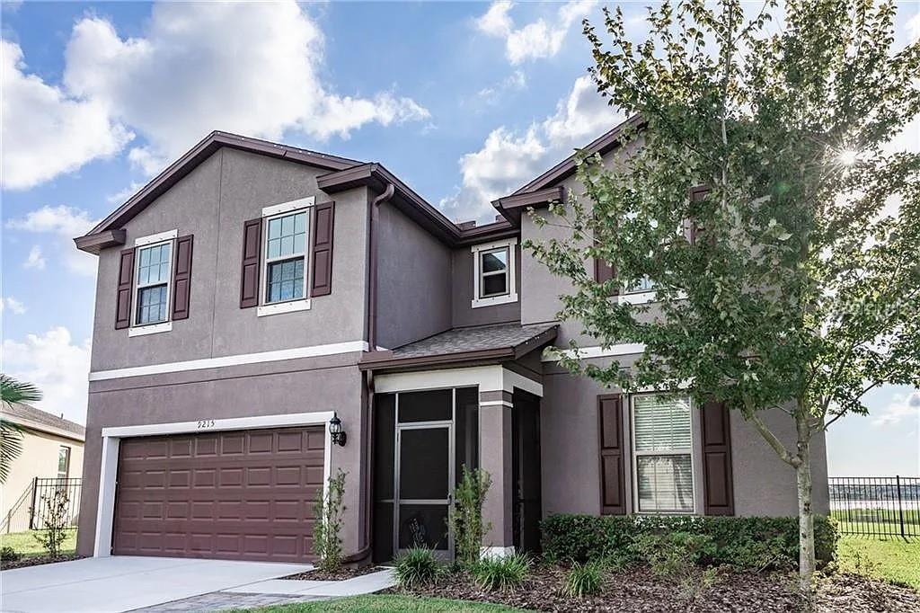 Experience worry-free living in this stunning two-story home, located in the desirable, gated community of Magnolia Park. With HOA-covered lawn maintenance, this home is perfect for any family size. The floor plan features an open-concept kitchen with ample countertop space, perfect for preparing meals and entertaining guests. The sizeable great room is ideal for game nights, movie nights, and gatherings. A rear covered lanai offers a peaceful spot for afternoons. This home boasts a first-floor master bedroom. Secondary bedrooms all include large closets, and a large loft with tray ceiling provides a versatile space for play or entertainment. A grand foyer leads to a flex room, perfect for a formal living room, dining area, or home office. Enjoy sleek granite countertops, a center island with a breakfast bar, a walk-in pantry, and a sun-drenched eat-in area that opens to the fenced backyard. Ceramic tile is featured in the kitchen and all wet areas. The spacious and serene primary bedroom includes an en-suite bathroom with separate "his and her" vanities, a large step-in shower, and large walk-in closet. The fully fenced backyard offers peaceful pond views and plenty of room for outdoor entertaining. Enjoy access to a private community pool with lounging areas. The home is minutes from 301, I-75, and I-4, providing easy commutes to Tampa or Orlando, and close to premier shopping, dining, and entertainment. This energy-star standard home comes with all kitchen appliances, window blinds, and ceiling fans. Recent updates include a fully remodeled bathroom in 2022, a new AC in 2025, and a new water heater in 2026. Don't miss the opportunity to call this beautiful property home! Schedule your private tour today.