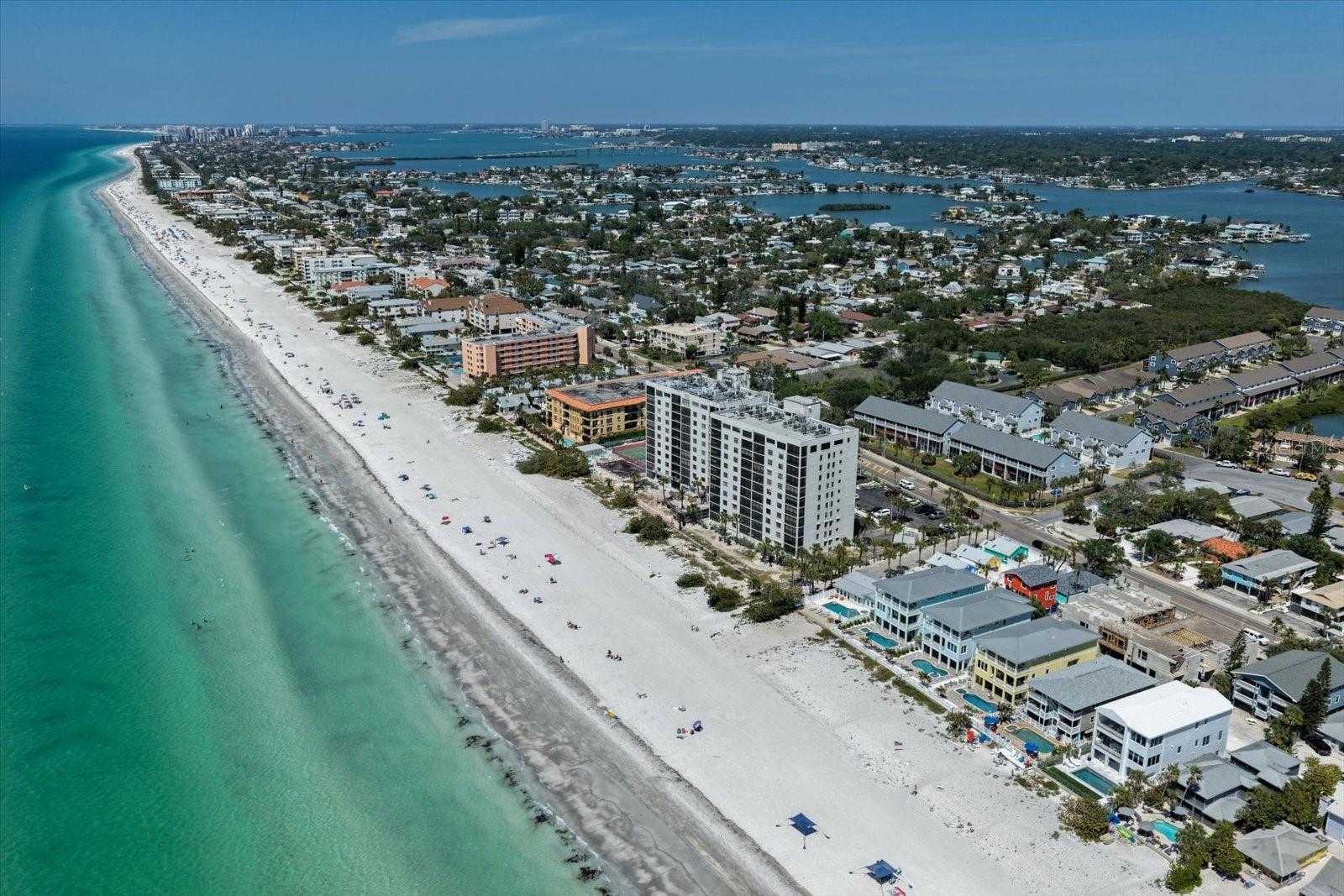Completely Renovated Direct Beachfront Corner Unit — Reflections on the Gulf, Indian Rocks Beach.
Experience turnkey beachfront living in this fully renovated corner unit at the sought-after Reflections on the Gulf. Perched directly on the Gulf with sweeping sunset views from the main living area and master suite, this bright corner residence features an open, modern floor plan, a tasteful, high-end kitchen, and fully updated bathrooms and flooring throughout. New building-wide renovations include brand-new balconies for all units and upgraded common areas. Additional highlights: in-unit washer/dryer, electric hurricane shutters, and one assigned covered parking space. The building allows short-term rentals with a 2-week minimum — an exceptional income opportunity. Resort-style amenities include a pool, tennis courts, hot tub, sauna, and on-site library. Tampa and Clearwater airports are each within a 45-minute drive. Contact the listing agent to schedule a showing or for rental/financial details.
