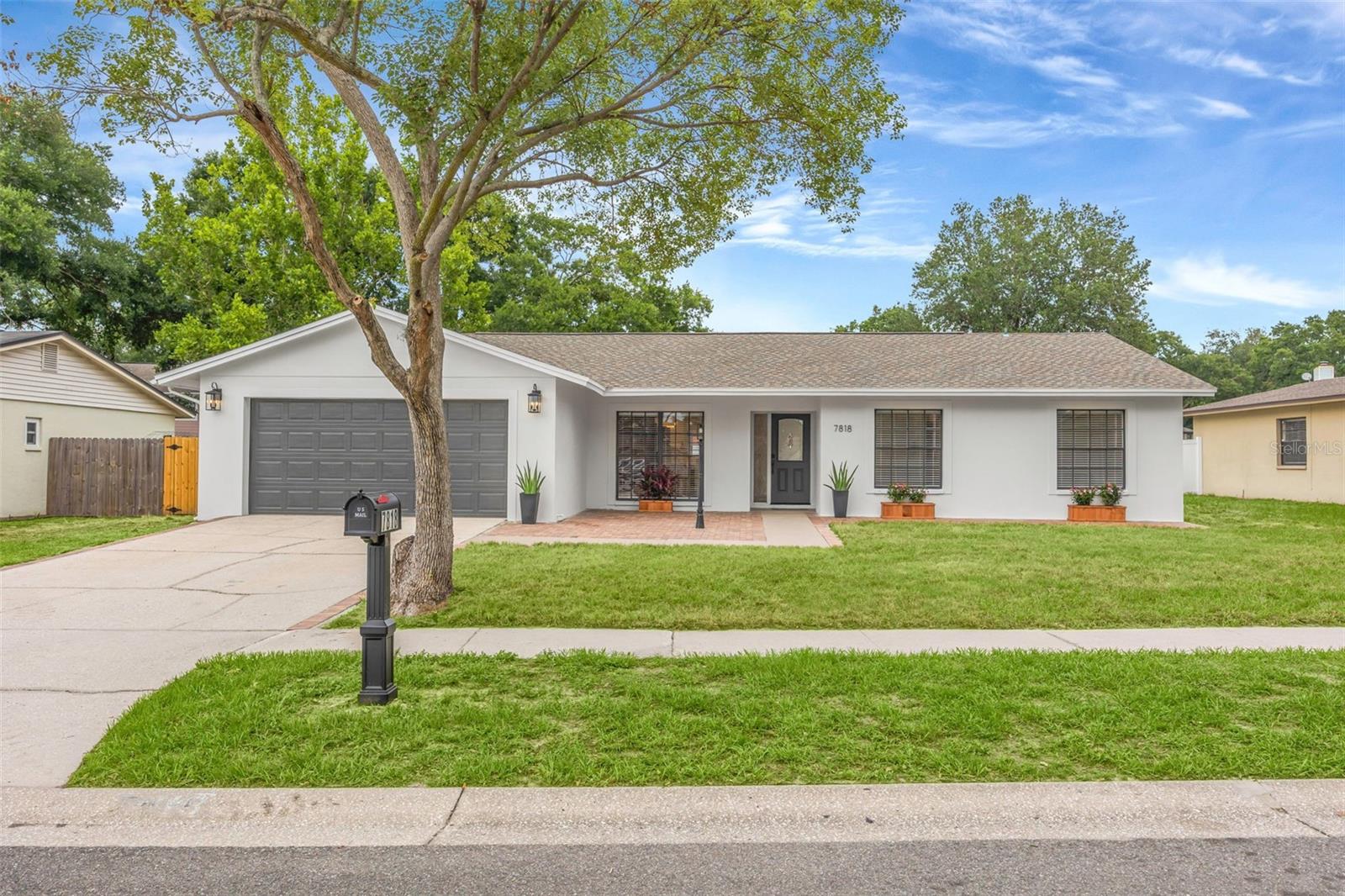 REMODELED TO PERFECTION! Step into this stunning, completely transformed residence where modern luxury meets peace of mind. Every detail of this home has been meticulously updated, starting with a brand-new gourmet kitchen featuring sleek wood cabinetry, premium Quartz countertops, a matching quartz backsplash, and stainless-steel appliances. The open-concept living space boasts soaring vaulted ceilings, brand-new Luxury Vinyl Plank (LVP) flooring, and crisp new baseboards and doors throughout. The primary suite serves as a private retreat with its own vaulted ceilings and a fully updated en-suite bath. All 3 bathrooms are beautifully reimagined with new vanities, modern fixtures, and custom tile work. Fully refreshed with new interior/exterior paint, gorgeous new stucco, and updated light fixtures. Enjoy outdoor living in the fully fenced backyard, complete with fresh, vibrant new sod. BONUS: Roof replaced in 2022! Absolutely nothing left to do but move in and enjoy!
