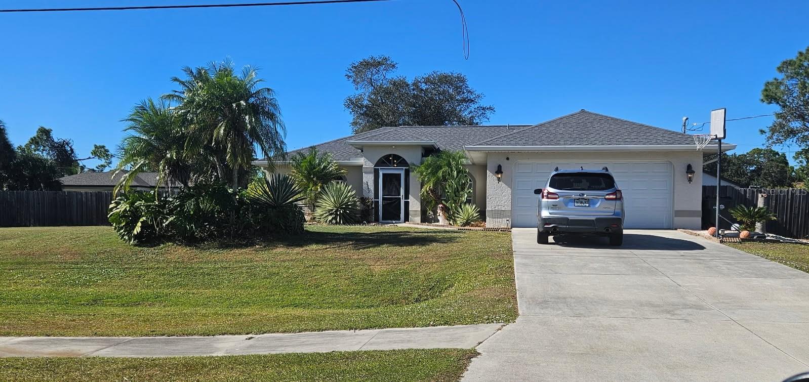 Short Sale. Exceptional value! Ready for move in the Florida lifestyle? Make your dreams a reality in this updated 3 Bedroom 2 Bathroom 2 Car Garage Pool home on 2 lots in North Port! Cathedral ceilings and large windows make this home even more bright and inviting. The kitchen has been updated with butcher block countertops, stainless steel appliances (less than 2 years old), and a tile backsplash. The breakfast bar is a great space for entertaining and extra seating! The tile throughout is laid on the diagonal, giving the house a more spacious feel. In the large master suite, you'll find a walk-in closet and, in the bathroom, a walk-in shower with floor to ceiling tile. Beautiful French Doors lead to a large, covered lanai, a great place to enjoy your morning coffee. In the afternoon, take a dip in the saltwater pool to cool off and relax under the sun. The back yard is completely fenced, perfect for "fido" to run and play! The permit records the roof was replaced in 2017, AC in 2016, and the garage door in 2021. Easy access to I-75 and shopping! North Port offers plenty to do! The Atlanta Braves Spring Training Facility and North Port Aquatic Center are great places for entertainment! Lots of options for shopping too! This home is ready for you! Call today to make your appointment to make your dreams of Florida Living Come True!