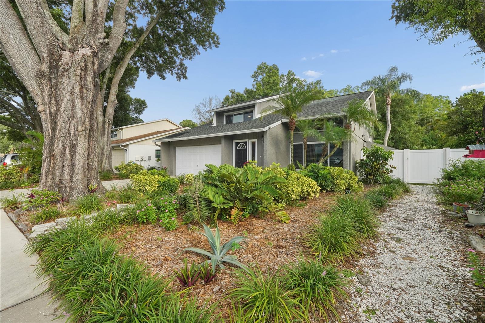 Welcome to 4712 Deerwalk Avenue, a warm and inviting Northdale-area home surrounded by beautiful greenery, mature landscaping, and a peaceful backyard setting that feels like a private oasis in the city. From the charming front garden to the serene conservation-style view out back, this home offers a wonderful opportunity to enjoy comfort, privacy, and everyday convenience in a well-loved Tampa location.

Inside, you will find **3 BEDROOMS**, **2.5 BATHS**, a **PRIVATE POOL**, **UPDATED KITCHEN**, **NEWER A/C AND AIR HANDLER 2024**, **WATER HEATER 2023**, **UPDATED WINDOWS**, **NEWER CEILING FANS**, **GARAGE OPENER 2024**, and **POOL MOTOR 2025**. Additional updates include roof repairs/maintenance, siding updates, new sink and garbage disposal, and closet door updates.

The home offers a comfortable layout with all bedrooms upstairs, generous living space, garage storage, and a backyard made for relaxing, gardening, entertaining, or simply enjoying the peaceful outdoor setting. The pool area and garden backdrop create a special lifestyle feel, with plenty of opportunity for the next owner to personalize the home and make it their own.

Conveniently located near Northdale, Carrollwood, shopping, dining, parks, schools, and major roadways, this home combines everyday convenience with a quiet residential feel. A wonderful opportunity for a buyer looking for space, privacy, a pool, and the chance to add their own personal touch. **Schedule your private showing today and come experience the peaceful setting of 4712 Deerwalk Avenue for yourself.**