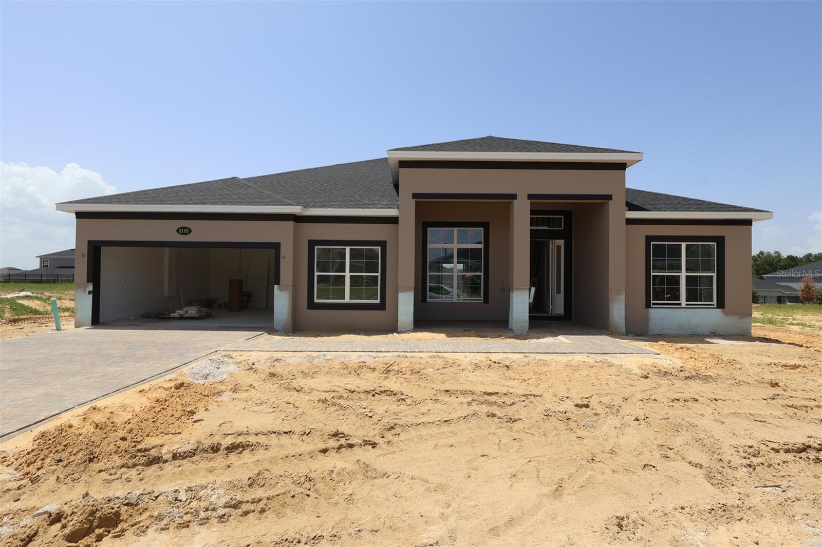 Under Construction. Welcome to 3193 Wolf Lake Avenue in Apopka, Florida: a new construction single-story home built by M/I Homes. This thoughtfully designed home offers 3,022 square feet of well-planned living space with 4 bedrooms and 3 bathrooms, perfect for comfortable everyday living.

Step inside to discover an open-concept living space that creates a seamless flow between the main gathering areas of the home. The quality of design is evident throughout, from the carefully considered layout to the refined finishes that bring each room together with cohesion and style.

Other highlights in this single-story, split-bedroom home include formal living and dining rooms, a kitchen island, a walk-in pantry, a covered lanai for outdoor relaxation and entertaining, and an oversized 2-car garage.

The private owner's bedroom provides a relaxing retreat at the end of the day, featuring an en-suite bathroom with a separate tub and shower and tub, split vanities, and two walk-in closets. Additional bedrooms offer generous space for family members and guests.

The covered lanai extends the living area outdoors, creating an inviting space to enjoy the Florida weather year-round. This home is situated in a welcoming neighborhood with convenient proximity to parks, making it easy to enjoy an active outdoor lifestyle.