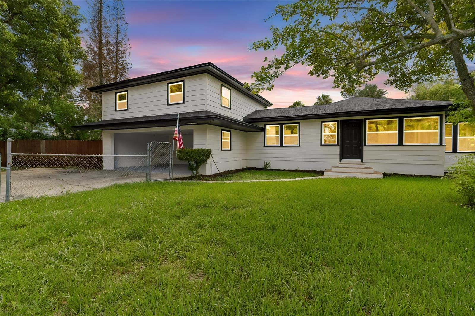 Totally Renovated Sanford Home on a Rare 0.55-Acre Corner Lot — Just Minutes from Downtown
Welcome to 400 Plumosa Drive, an extraordinary property unlike anything else on the Sanford market. Set on a private, oversized 0.55-acre corner lot, yet just 0.9 miles — a four-minute drive — from the beloved heart of Historic Downtown Sanford, this home offers a rare blend of space, privacy, and unbeatable location. Totally renovated from top to bottom — new roof, new windows, new appliances, new A/C, new water heater, updated electrical system, updated flooring, remodeled bathrooms, and fresh finishes throughout — it's completely move-in ready.
Offering 4 bedrooms and 3 full bathrooms, the single-story main home lives bright and open, with an independent entry hall, a living room with attached office, a kitchen and dining room made for gathering, and large windows that fill every space with light. The 4th bedroom is where this property becomes truly special: a spacious 624 sq ft bedroom set on its own upper level, complete with a walk-in closet and a full bathroom. Private, generous, and full of light, it's the kind of space most homes simply don't have. Imagine it as a magnificent second primary suite — a grand owner's retreat set apart from the rest of the home — or reimagine it entirely as guest quarters, a game room, a creative studio, a teen hideaway, or a multigenerational living space. The possibilities here are genuinely yours to define.
A 2-car garage adds everyday comfort and storage.
Best of all is the land itself: room to entertain, garden, park an RV or boat, and space to grow — with exciting potential to add an ADU (Accessory Dwelling Unit) for guests, family, or passive rental income (subject to City of Sanford approval, zoning, permitting). Just beyond your door, downtown's brick-lined streets, restaurants, craft breweries, Riverwalk, and Lake Monroe await — with easy access to the airport, Lake Mary, and all of Central Florida. More than a house, 400 Plumosa Drive is an invitation to the life you've been imagining.