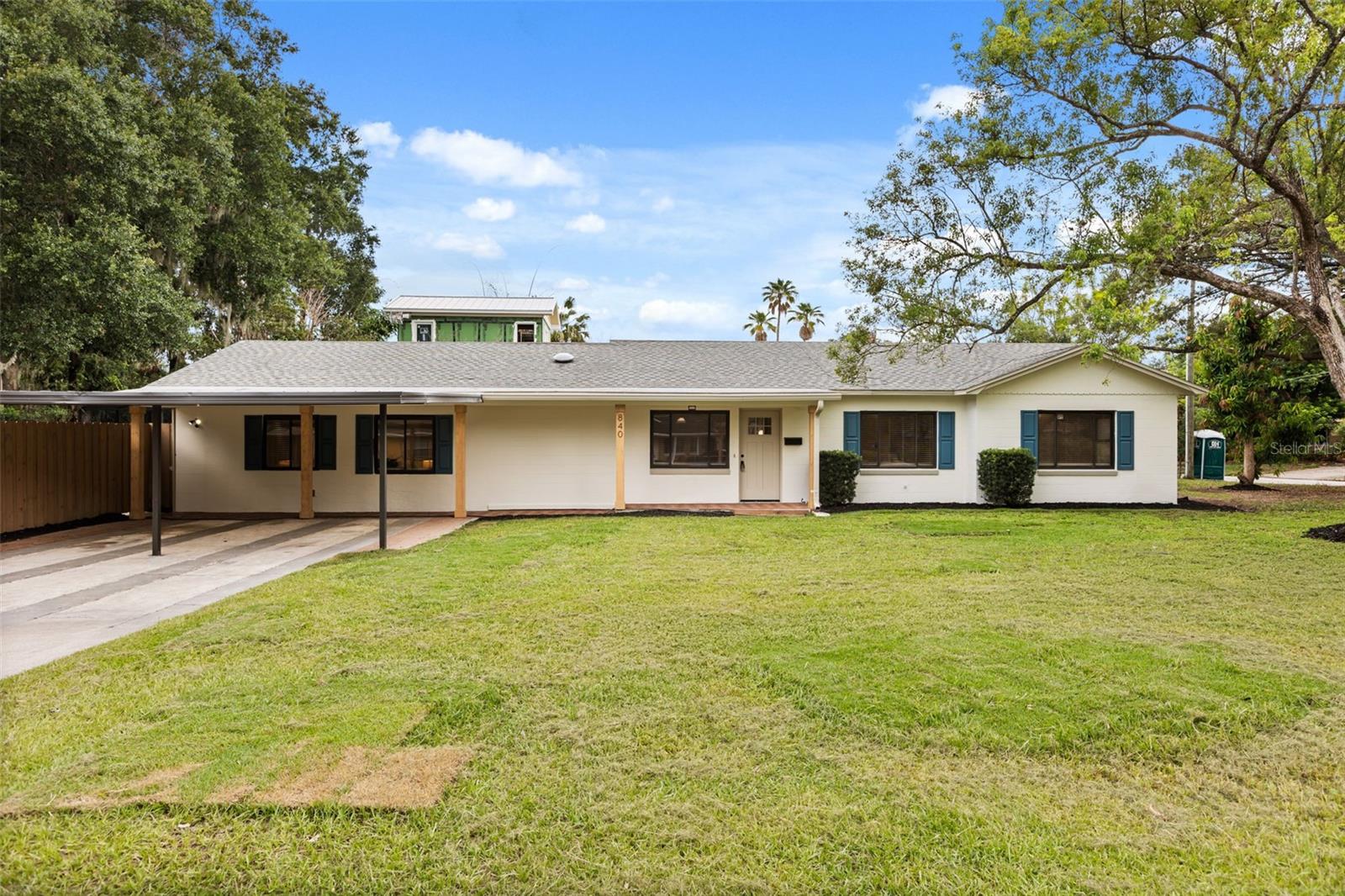 Welcome to 840 Huntington Place, a beautifully renovated 4-bedroom, 3.5-bath corner lot residence in the highly desirable Lake Como neighborhood. This exceptional home blends modern design, thoughtful functionality, and resort-style outdoor living. Inside, you'll find a desirable split-bedroom floor plan with a dual master suites, offering added privacy and flexibility for multi-generational living, guests, or a dedicated home office. The spacious layout also features two separate living rooms, providing ample space for entertaining, relaxing, or creating distinct gathering areas.  The stunning kitchen has been thoughtfully designed with soft-close slim shaker cabinetry, luxurious Taj Mahal quartzite countertops, and a full suite of Samsung stainless steel appliances. Throughout the home, durable 22 mil luxury vinyl plank flooring, new interior doors, and beautifully renovated bathrooms create a cohesive, move-in-ready feel. Step outside to your private backyard oasis featuring a newly resurfaced and retiled pool, brand-new deck, new privacy fencing, and a fully equipped outdoor kitchen. Designed for both relaxation and entertaining, this inviting outdoor space is perfect for hosting family and friends or enjoying Florida's year-round sunshine. Every detail has been carefully updated to offer modern comfort, timeless style, and effortless living. Don't miss the opportunity to make this exceptional Lake Como home your own. Schedule your private showing today!