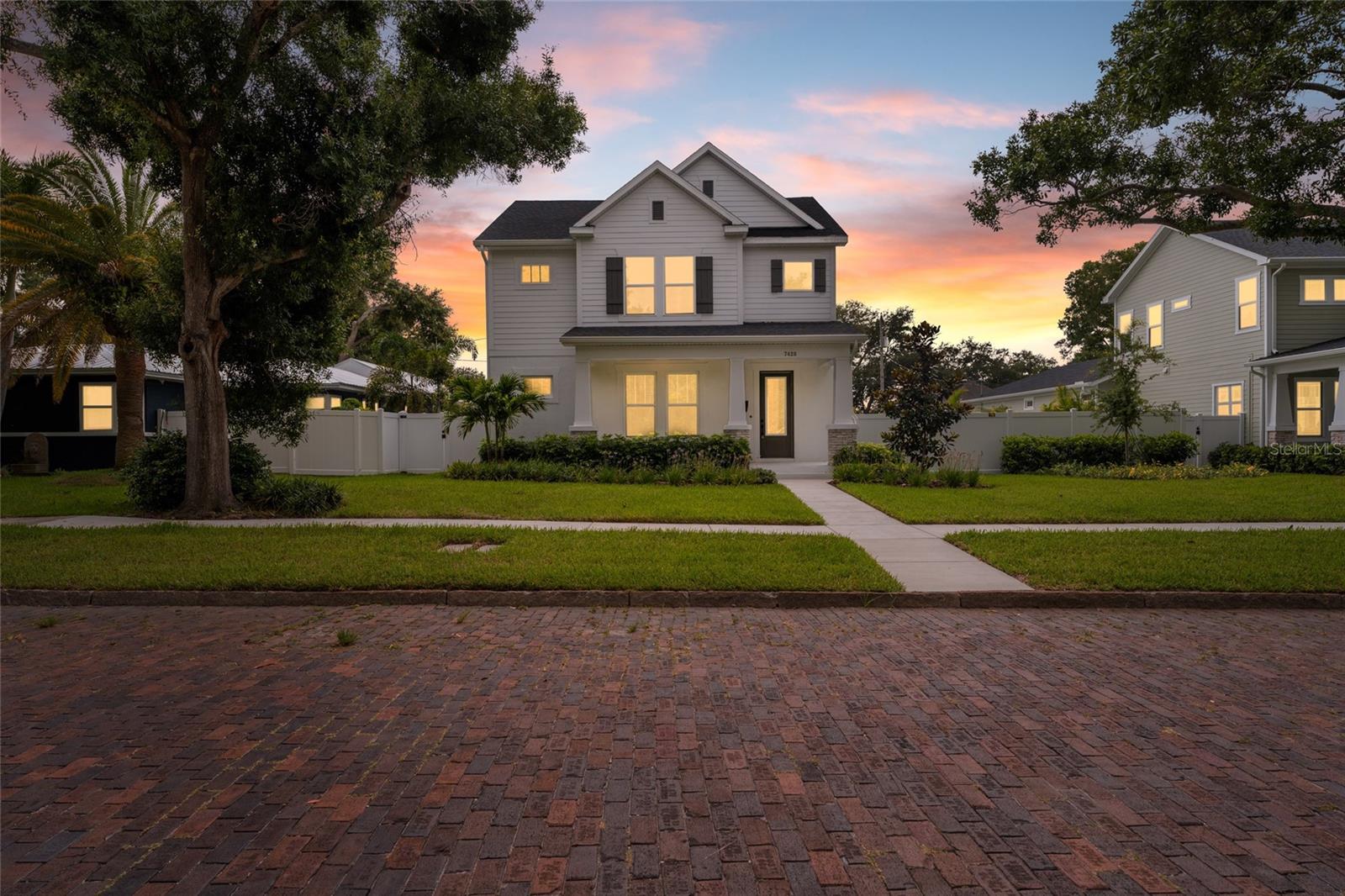 Exceptional newer construction residence located in one of St. Petersburg's most desirable neighborhoods. This beautifully designed home offers an open-concept floor plan filled with natural light, soaring ceilings, laminate flooring, impact-rated windows, and designer finishes throughout.

The chef's kitchen serves as the centerpiece of the home, featuring an oversized quartz island, custom cabinetry, stainless steel appliances, a built-in wall oven and microwave, gas cooktop, wine refrigerator, walk-in pantry, and abundant storage. The spacious living and dining areas flow seamlessly for everyday living and entertaining.

The first-floor office provides an ideal work-from-home space, while the upstairs retreat includes generously sized guest bedrooms and a luxurious primary suite featuring a tray ceiling, oversized custom walk-in closet, and spa-inspired bath with dual vanities, an expansive walk-in shower, and premium finishes.

Additional highlights include a dedicated laundry room with built-in cabinetry, a mudroom/drop zone, an oversized garage with epoxy flooring, ample storage, and a fully fenced backyard with room for a pool.

This stunning residence combines modern construction, thoughtful design, and an unbeatable St. Petersburg location near the waterfront, parks, schools, and vibrant downtown amenities.