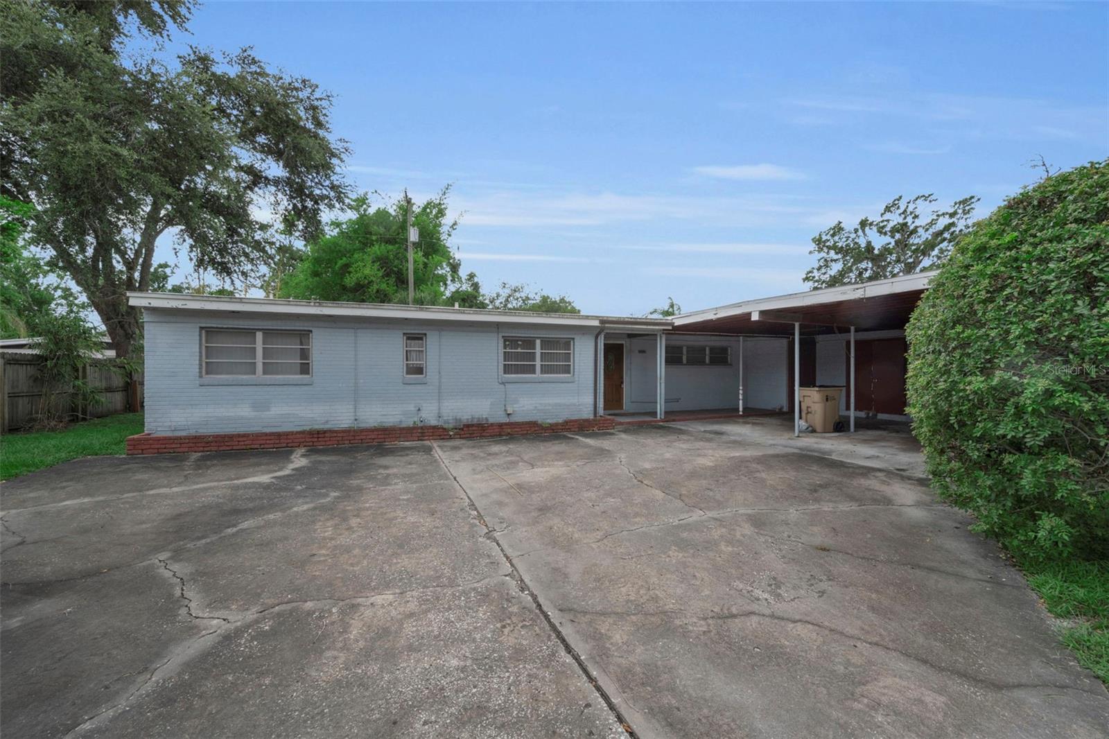 **HANDYMAN SPECIAL WITH INCREDIBLE POTENTIAL IN THE HEART OF TEMPLE TERRACE!** Opportunity knocks with this spacious 4-bedroom, 2-bath concrete block home offering solid bones, timeless terrazzo floors throughout, and endless possibilities for renovation. Whether you're an investor searching for your next project, a flipper looking to maximize value, or a homeowner ready to create your dream home, this property is the perfect canvas.

Inside, you'll find a generous floor plan with a large living area, spacious bedrooms, and original terrazzo floors throughout much of the home, ready to be restored to their original beauty. The kitchen and bathrooms provide an excellent opportunity to update and personalize while preserving the home's solid construction and mid-century character.

An enclosed bonus room with a wall-mounted A/C unit offers flexible space for a home office, game room, hobby room, or additional living area. This bonus room is **not included** in the home's 1,797 heated and cooled square feet, providing even more functional space than reflected in the official living area.

Outside, the covered carport, attached storage/workshop, and oversized driveway offer plenty of room for vehicles, tools, and weekend projects. Major improvements have already been completed, including a **new roof in 2016** and **HVAC system in 2019**, allowing you to focus your renovation budget on cosmetic updates.

Perfectly situated in desirable Temple Terrace, you'll enjoy walking distance to **Riverhills Elementary Magnet School** and **Riverhills Park**, where you can picnic, play, or launch your kayak at the nearby public boat ramp for a scenic paddle along the Hillsborough River. The home is also just minutes from the University of South Florida, Busch Gardens, Adventure Island, Moffitt Cancer Center, VA Hospital, major highways, and an abundance of shopping, dining, and entertainment.

Whether you're looking for your next flip, an investment property, or a home you can renovate to your own style, this property offers exceptional value and unlimited potential in an established neighborhood.

**Highlights & Updates:**

* 4 Bedrooms | 2 Bathrooms
* 1,797 Heated & Cooled Sq. Ft.
* Enclosed bonus room with wall A/C (not included in heated square footage)
* Original terrazzo floors throughout
* **Roof replaced in 2016**
* **HVAC replaced in 2019**
* Covered carport with attached storage/workshop
* Walking distance to Riverhills Elementary Magnet School
* Walking distance to Riverhills Park
* Minutes to USF, Busch Gardens, Moffitt Cancer Center, shopping, dining, and major commuter routes

**Bring your vision and unlock the potential of this Temple Terrace gem! Being sold As-Is.**