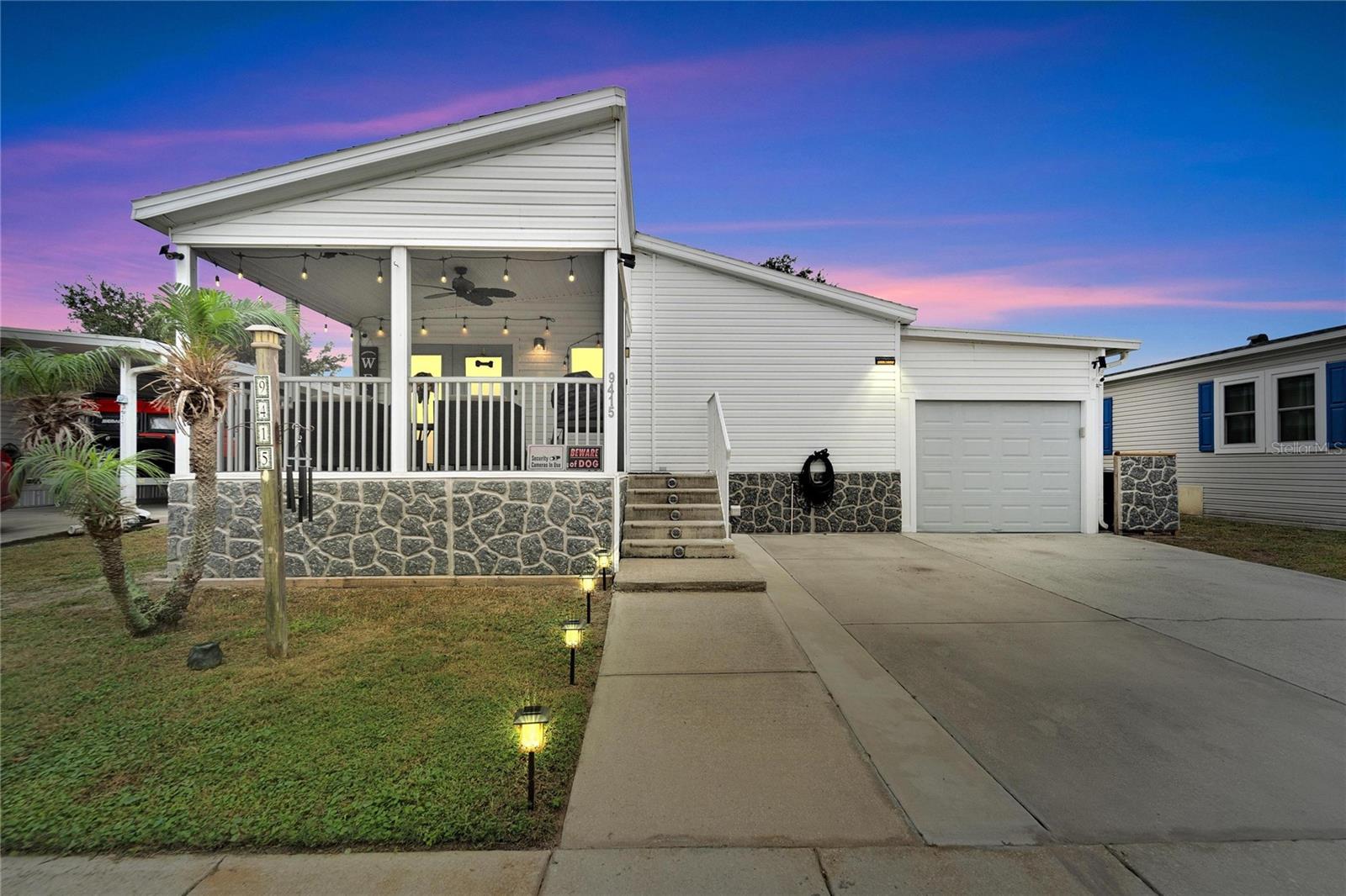 Price Reduction !! Check out this amazing 3 Bedroom, 2 bathroom mobile home WITH a 2 car garage. This home offers so many upgrades and located in the highly sought after gated community Lake Fantasia in Riverview! Garage is big enough to hold your boat, toys, cars and more with windows to open and close along the side with endless possibilities!! As you enter the home you will find the screened in screened patio out front that over looks the lake across the street, you are welcomed by the updated kitchen and open layout into the dining room and living room. There are nice oversized bedrooms with walk in closets in all the bedrooms. Newly painted indoor and outdoor along with updates in the bathrooms. There is a nice sized deck in the backyard that is completely fenced in your the family and/or pets. Roof 6 years old with 25 yr transferable warranty, A/C 6 yrs old, Water heater 7 yrs old and all appliances are 2 years old. Garage has a smart opener called MYQ Smart Opener. This community offers a large private lake with amenities that include homeowner owned and completely remodeled Clubhouse, Fitness Center, relax out by the lake for fishing, pool, private boat ramp, Boat and RV Storage, Basketball Courts and much more! Come see this beautiful home and community for yourself before it's too late.